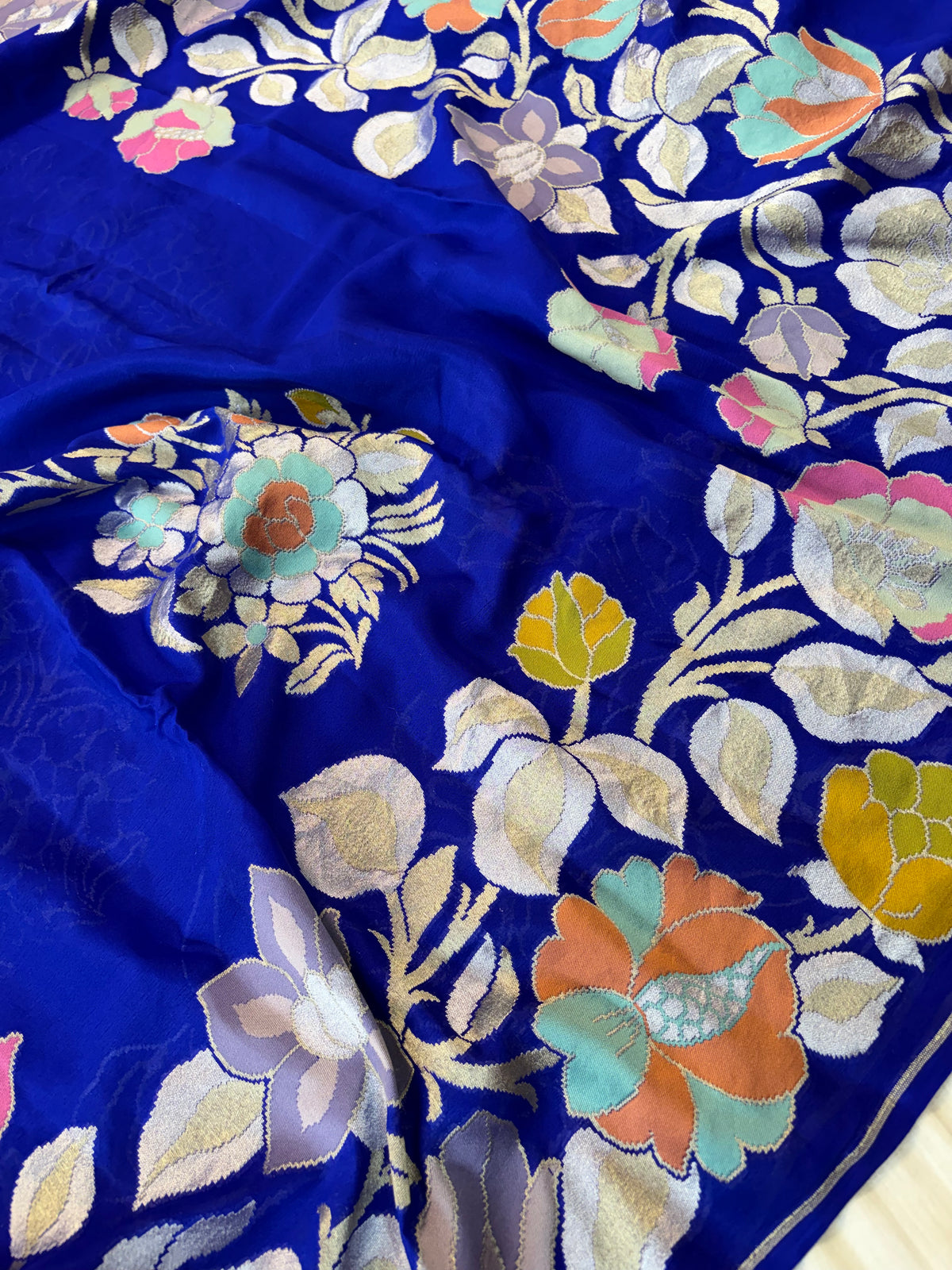 Pure premium georgette banarasi saree multi meena work in royal blue colour
