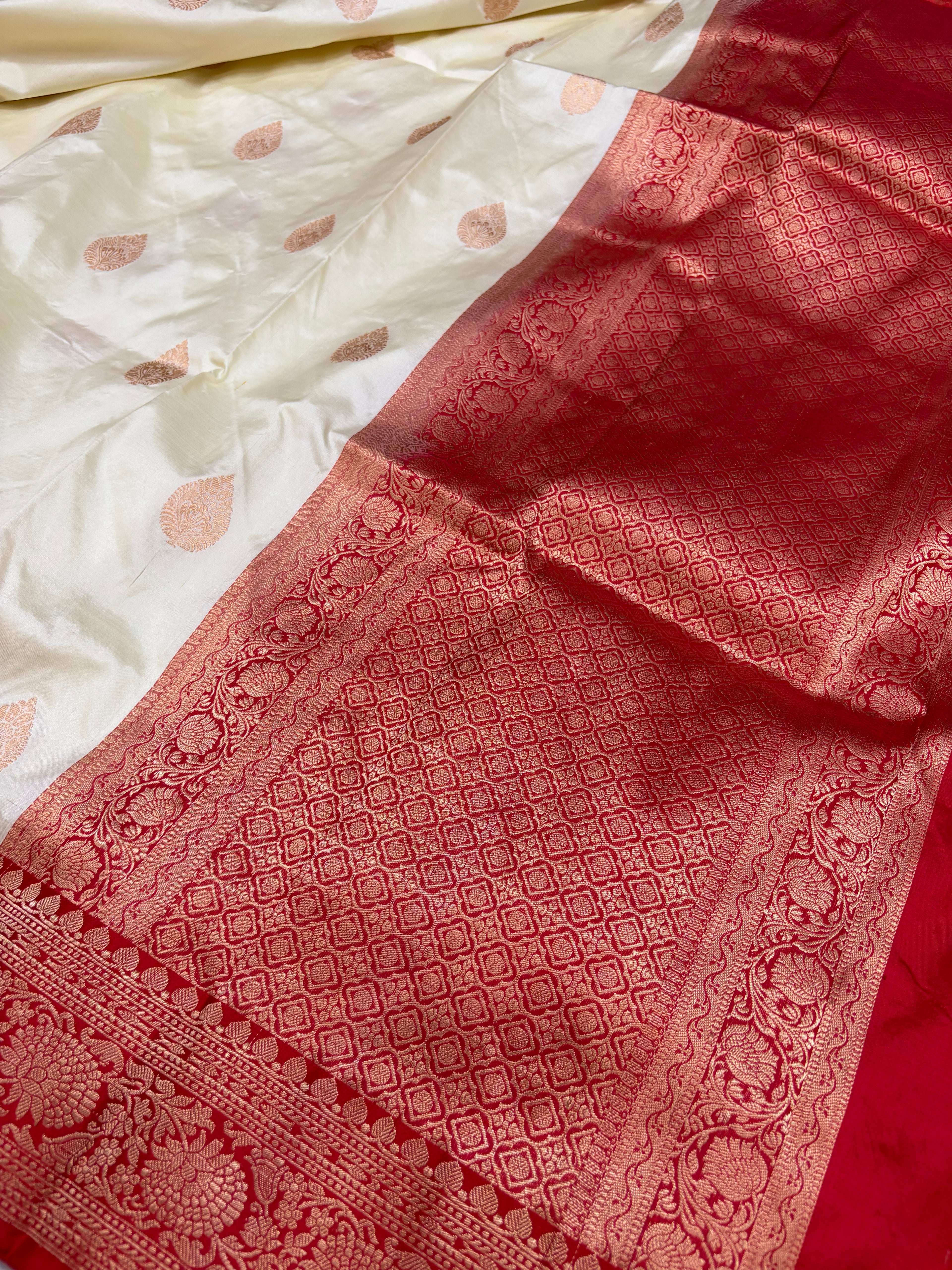 Pure handwoven katan silk saree in off white with red colour