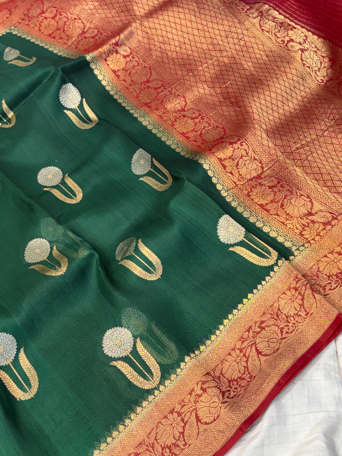 Pure handloom kora silk saree in bottle green with red colour