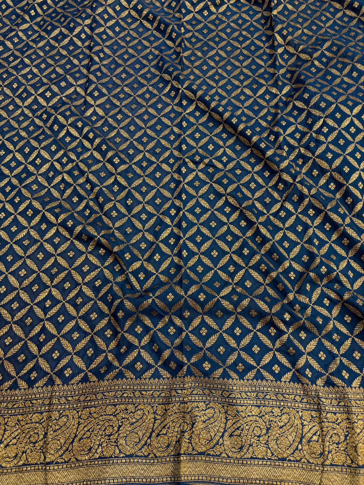 Pure khaddi crepe silk saree in Rust orange with navy blue colour