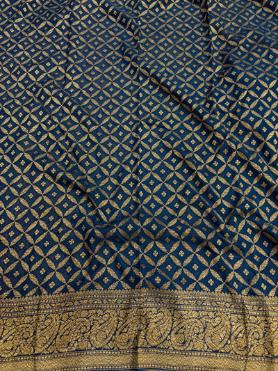 Pure khaddi crepe silk saree in Rust orange with navy blue colour