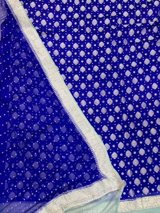 Pure khaddi chiffon suit in royal blue with sea green colour