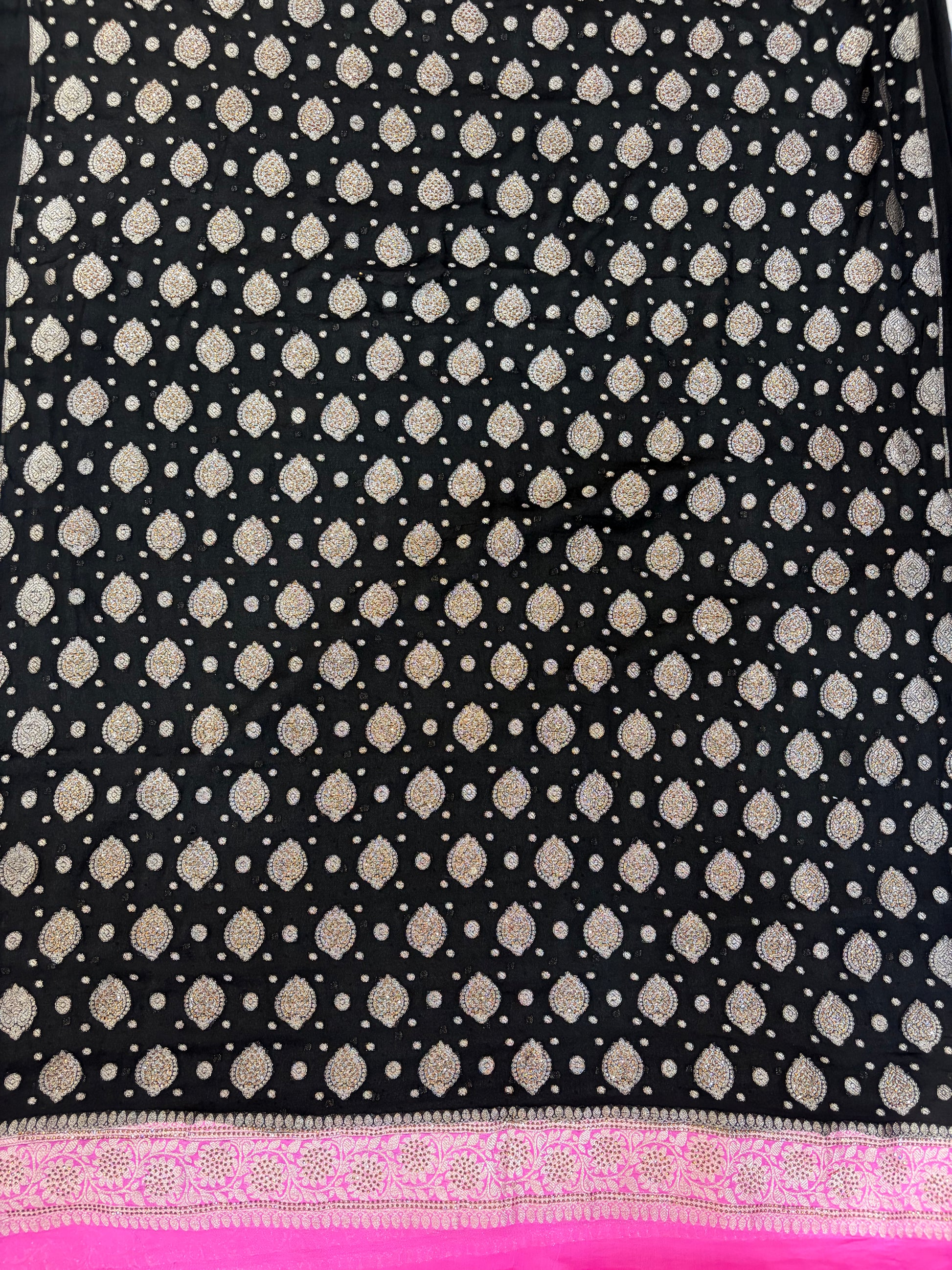 Pure khaddi chiffon suit in black with pink colour with all over swaroski work