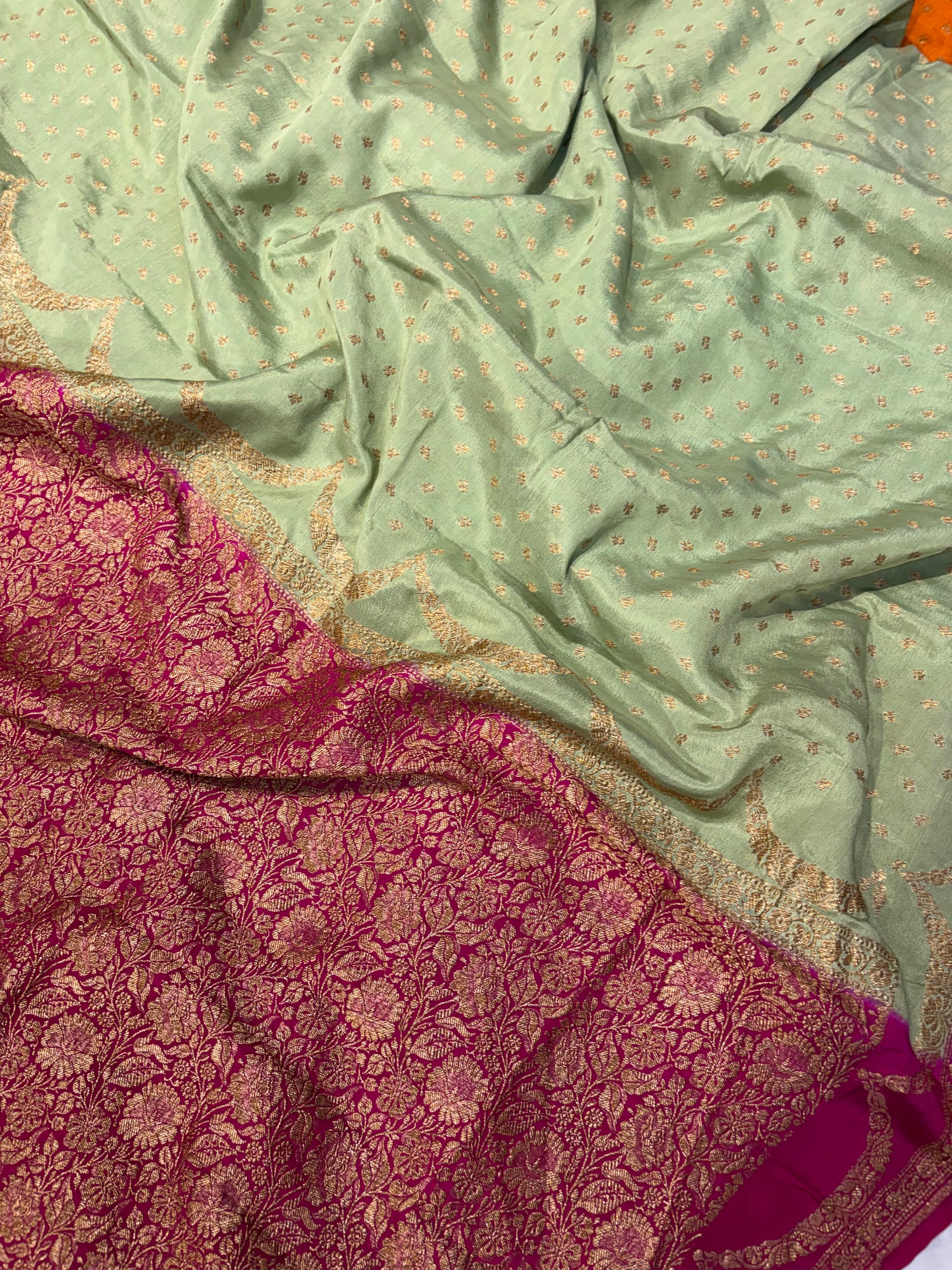 Pure khaddi crepe silk saree in pista green with Rani pink colour