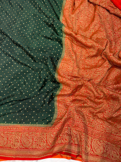 Pure khaddi crepe silk saree in bottle green with burnt orange  colour