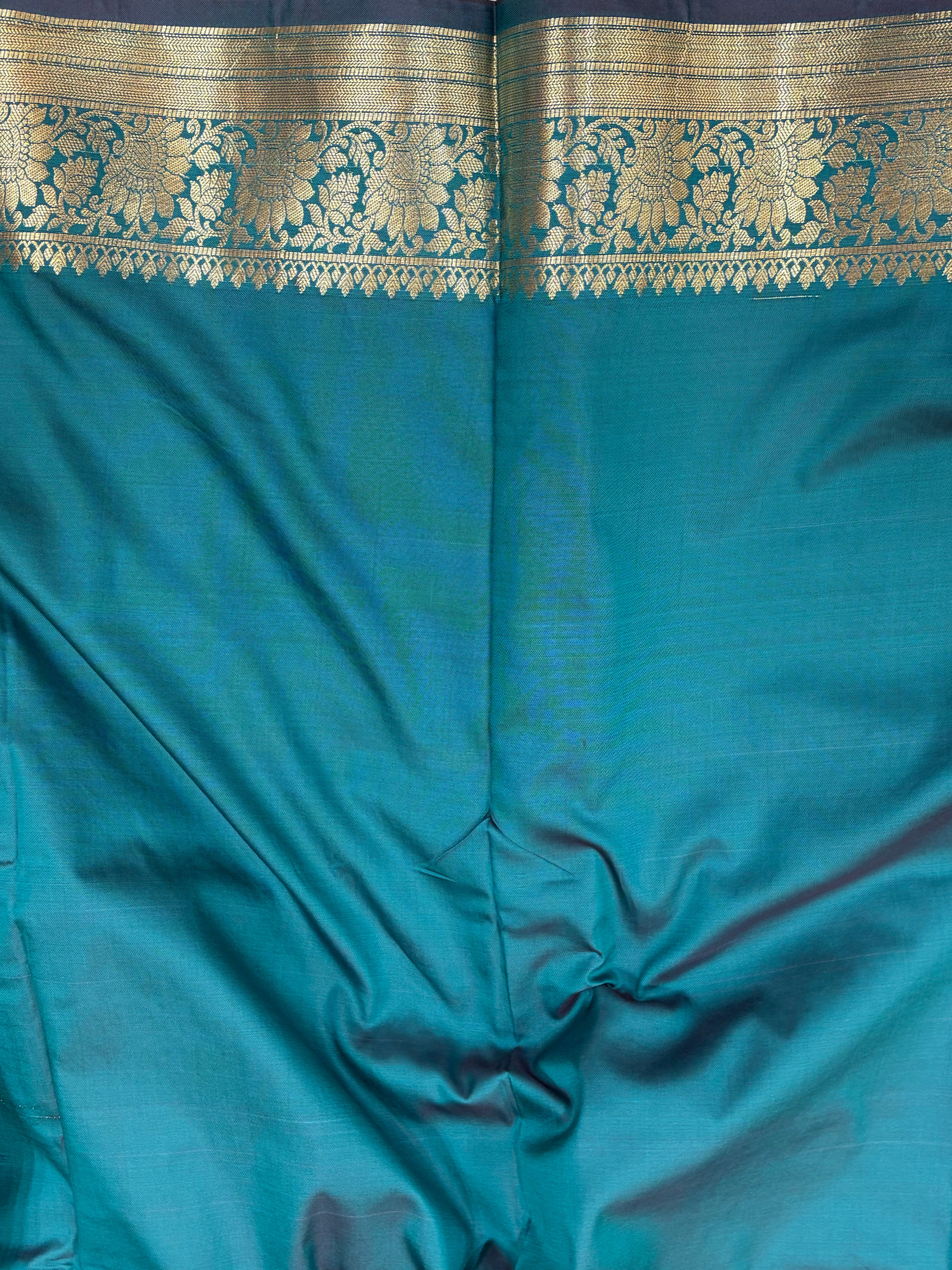 Banarasi katan by katan silk saree in Rama green colour with multiple meenakari work