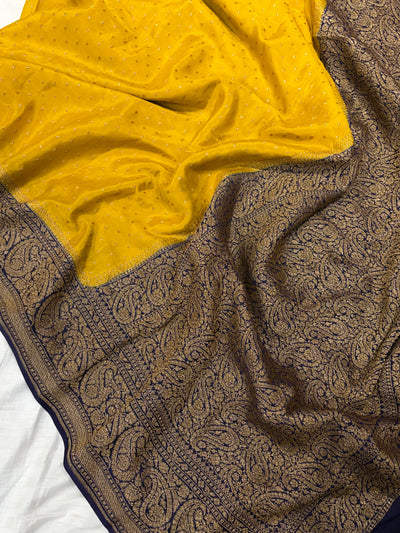 Pure khaddi crepe silk saree in mustard yellow with dark navy blue colour