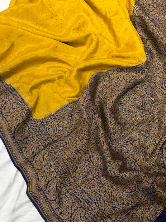 Pure khaddi crepe silk saree in mustard yellow with dark navy blue colour
