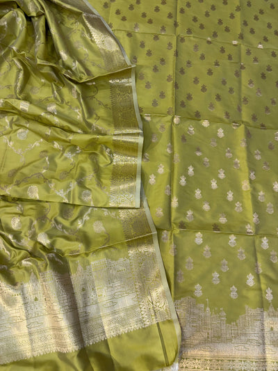 Banarasi soft silk suit in Lime green colour with temple design work