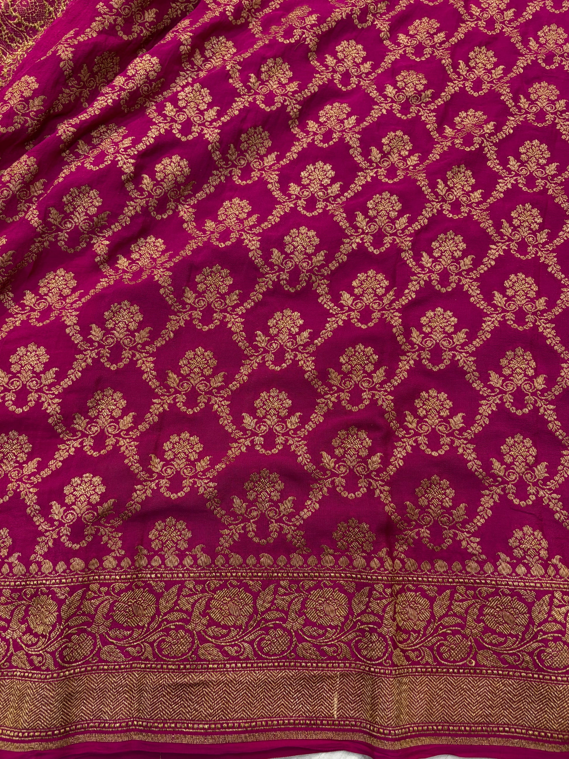 Pure khaddi crepe silk saree in black and Rani combination with pure antic zari work