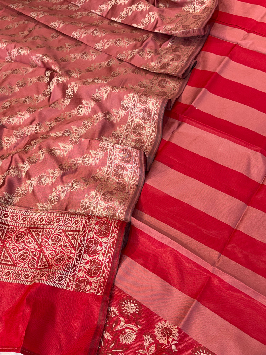 Banarasi soft silk suit in red with dusty rose colour combination with tussels