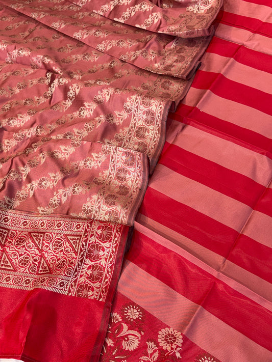 Banarasi soft silk suit in red with dusty rose colour combination with tussels