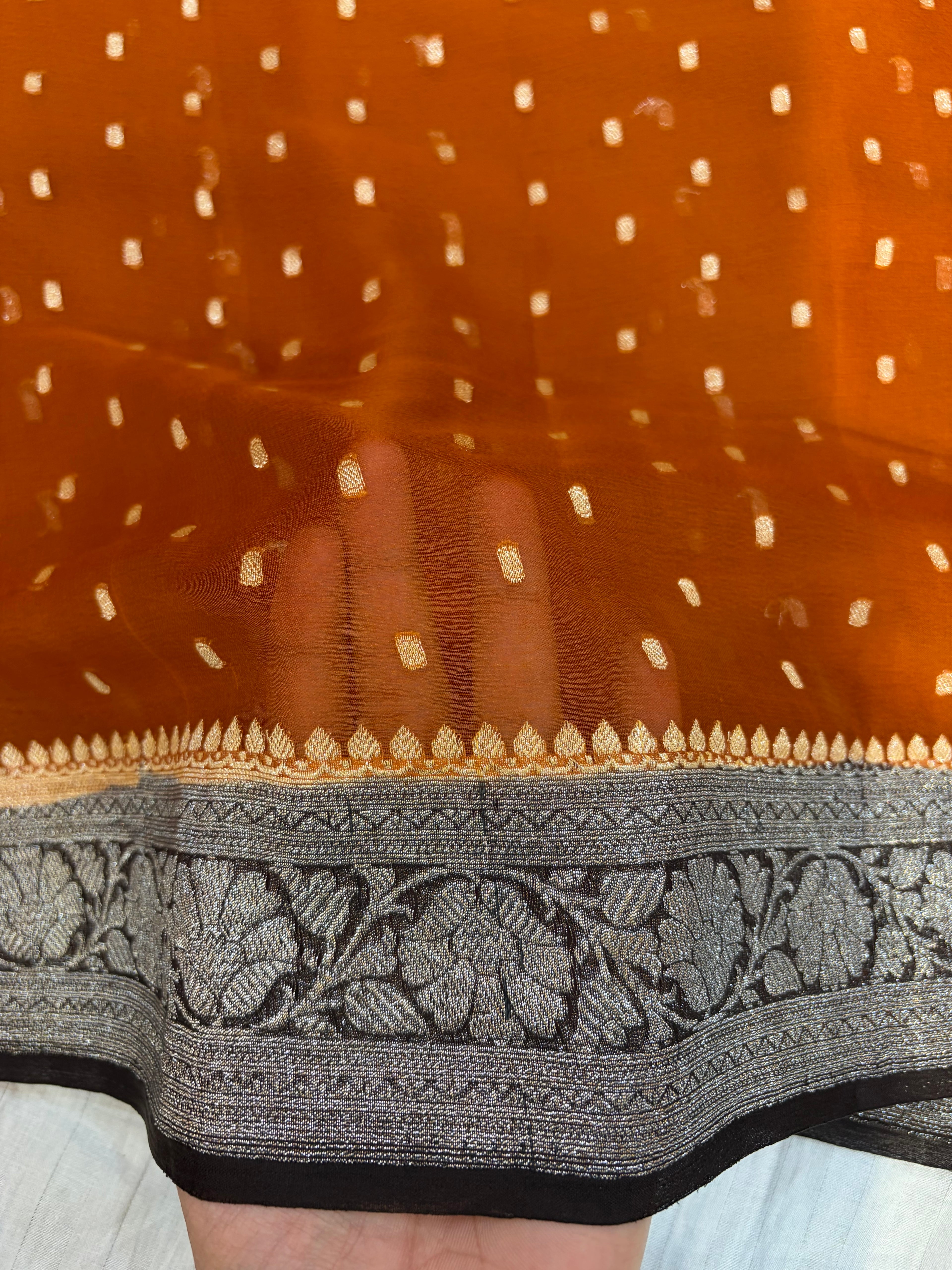 Pure khaddi chiffon chunri buti saree in rust orange with dark chocolate colour