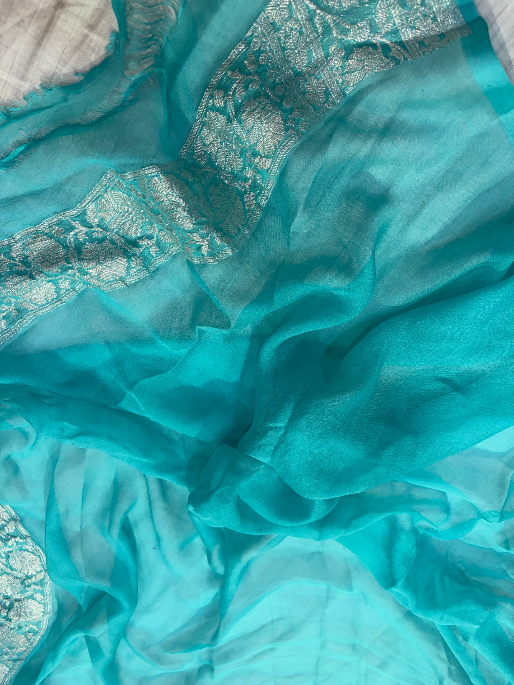 Pure khaddi chiffon saree in purple with ocean blue colour combination