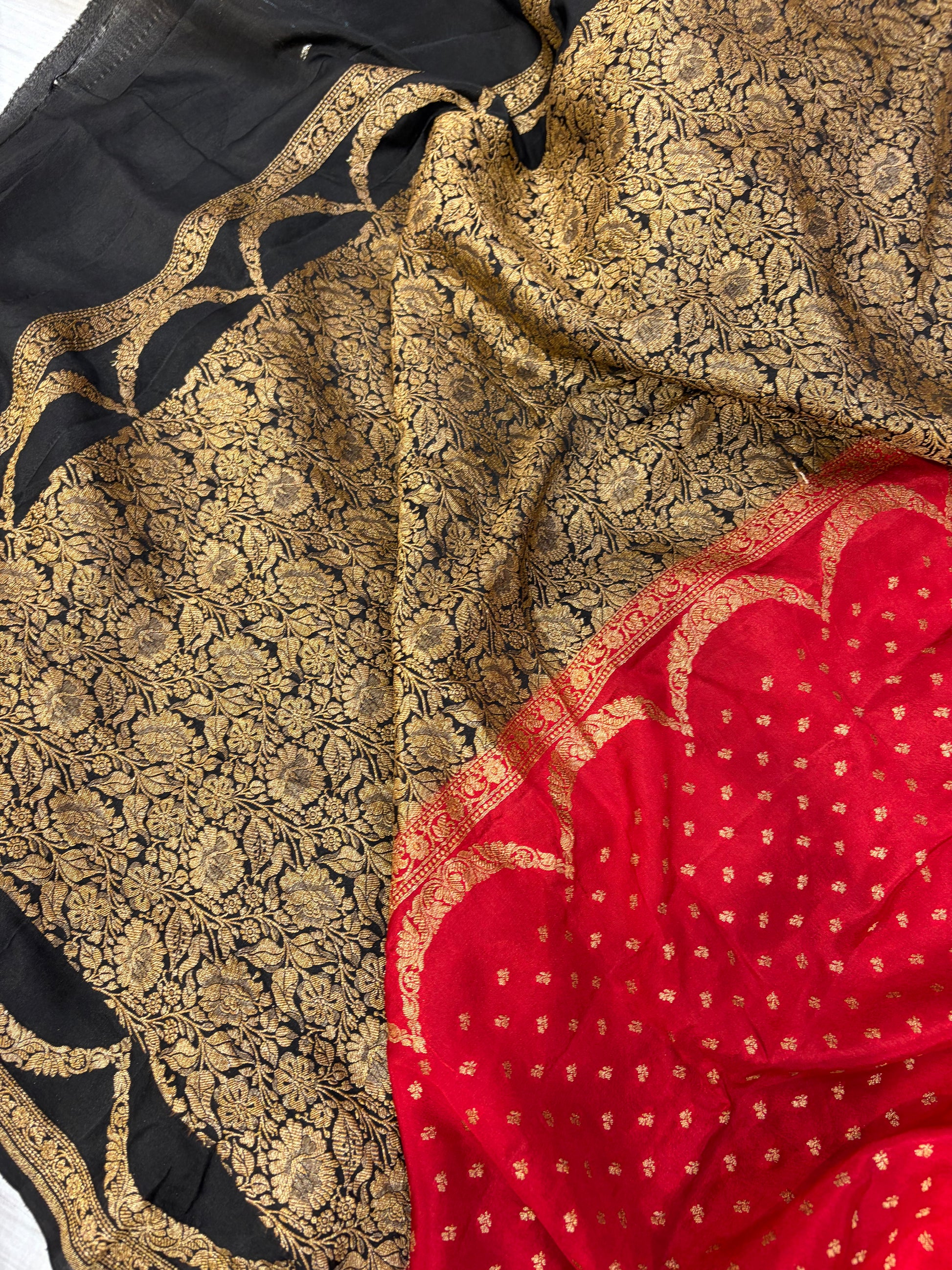 Pure khaddi crepe silk saree in red with black colour combination