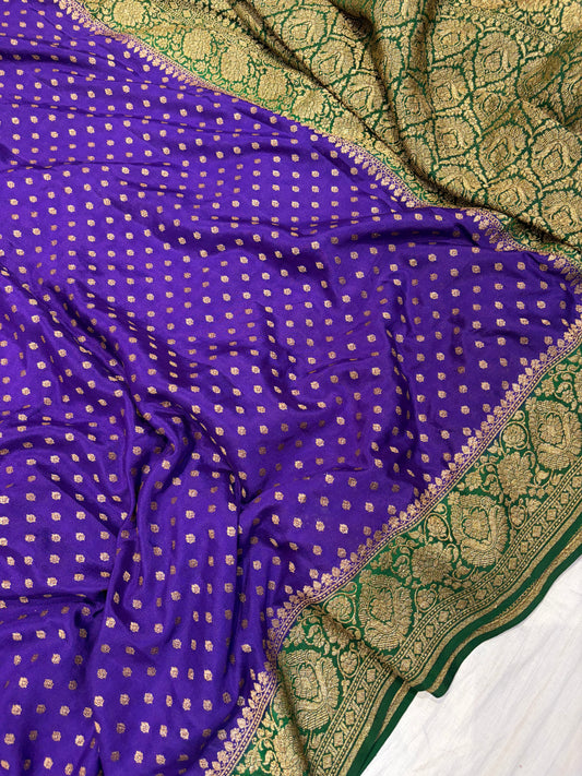 Pure khaddi crepe silk saree in purple with bottle green colour