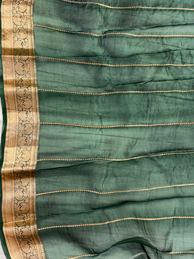 Pure handloom organza silk saree in bottle green colour