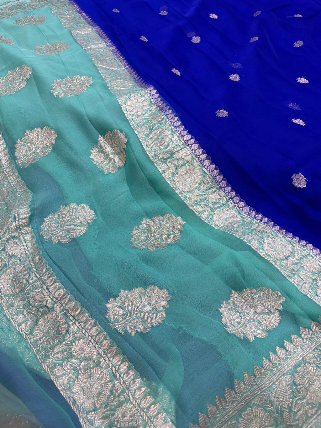Pure khaddi chiffon saree in Royal blue and sea green colour