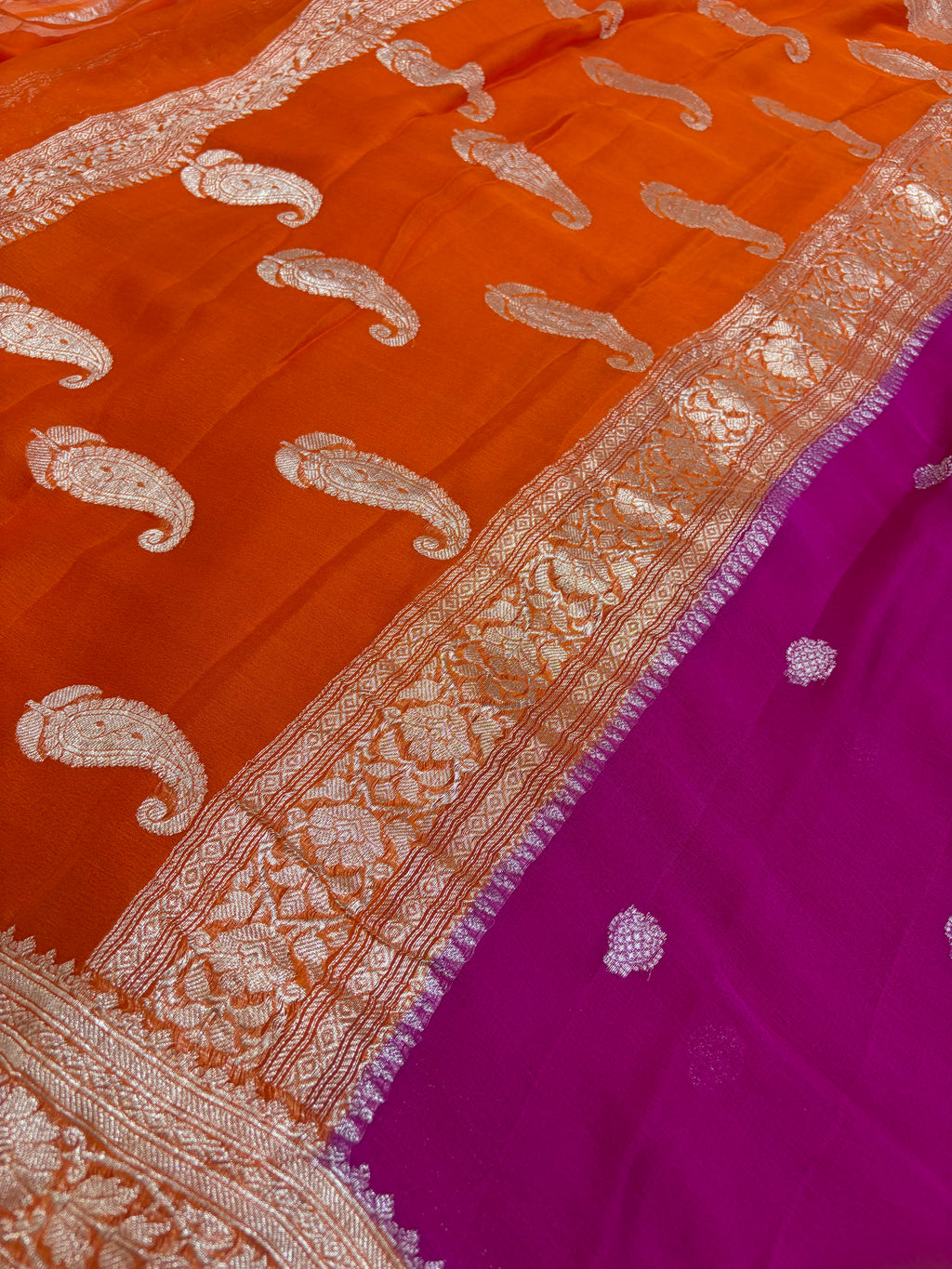 Pure khaddi chiffon saree is rani & orange colour