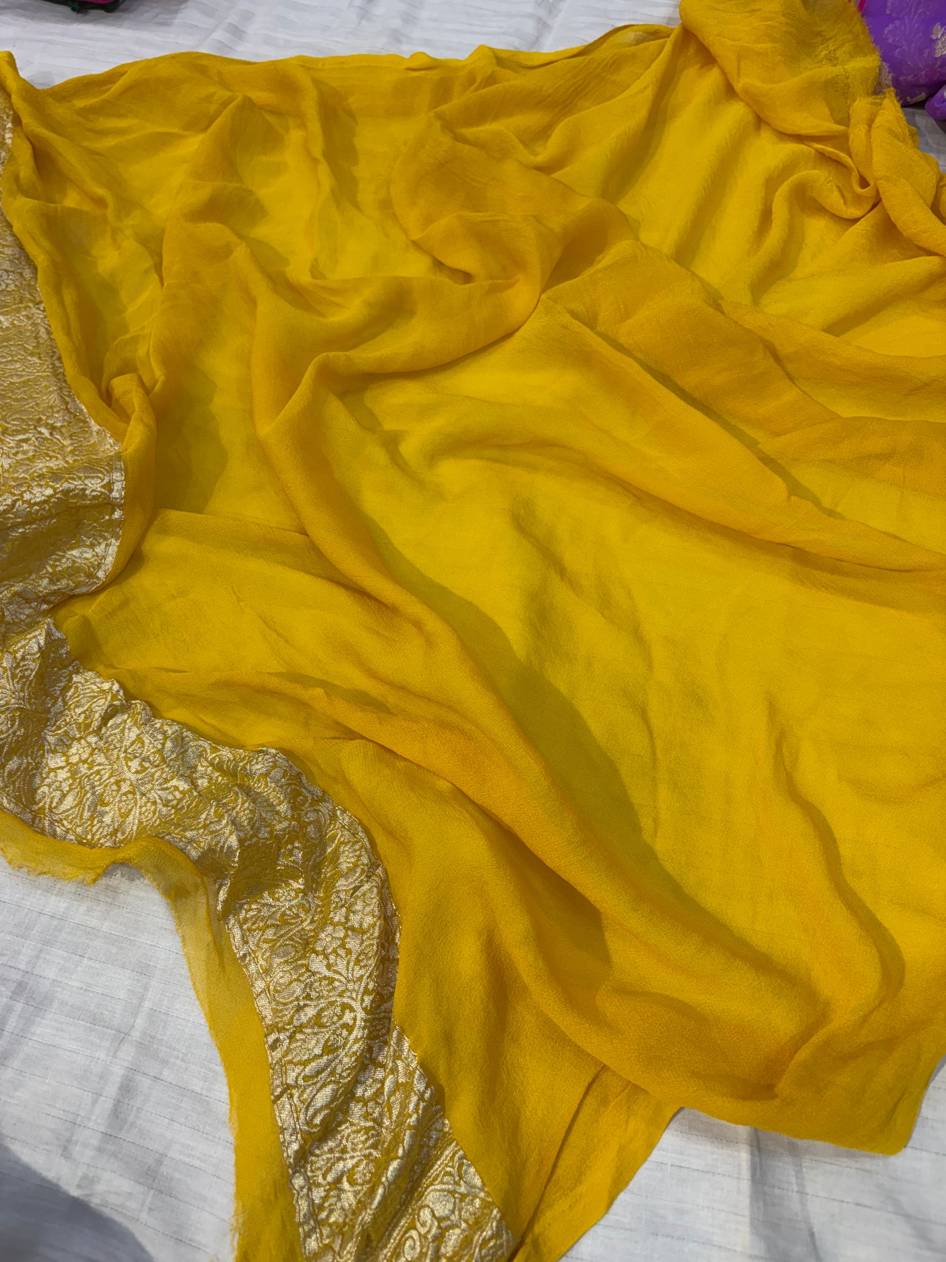 Pure Banarasi handloom georgette silk saree in levender with gold yellow colour