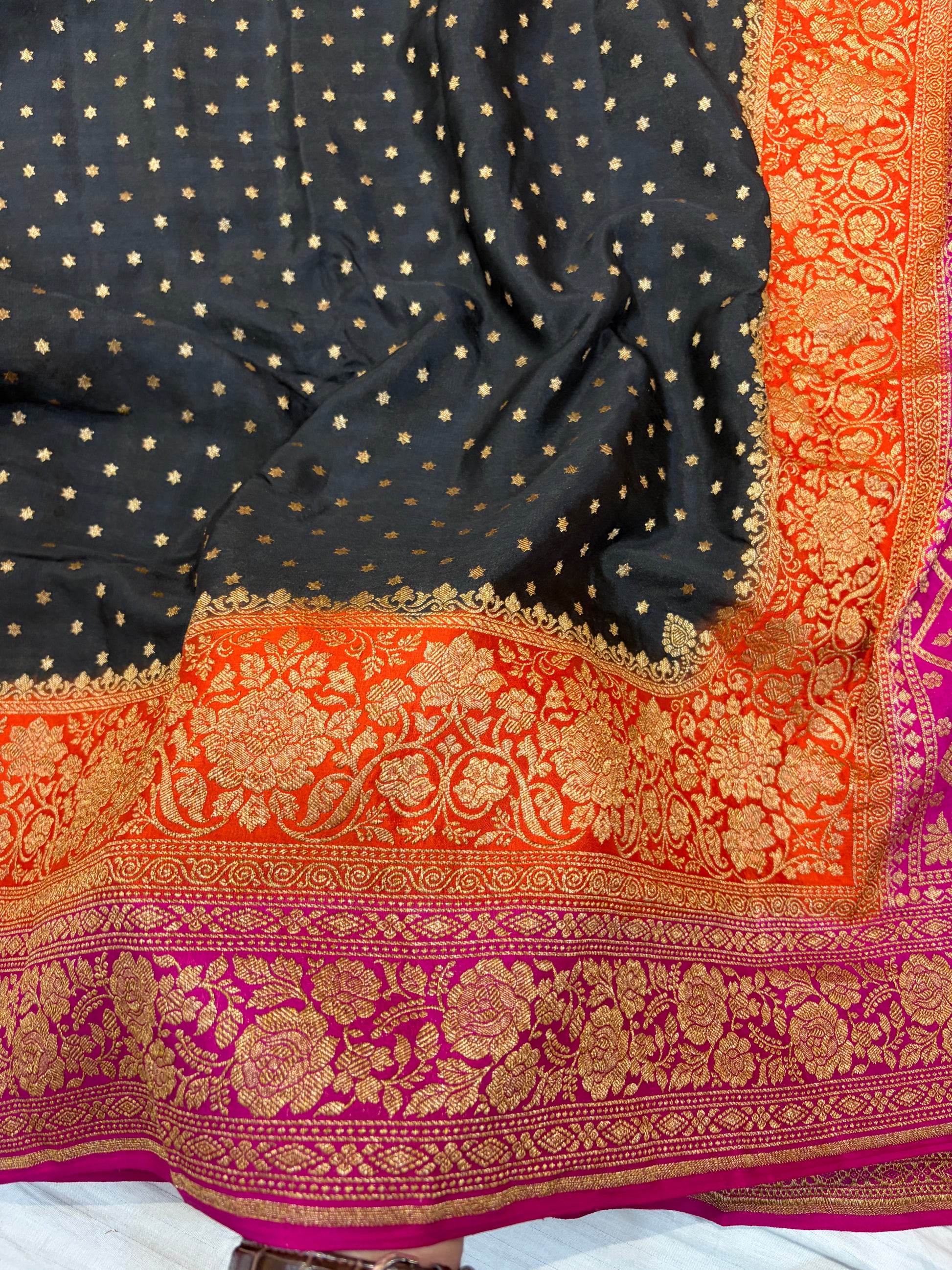 Pure khaddi crepe silk saree with 3D border in black orange & rani pink colour combination