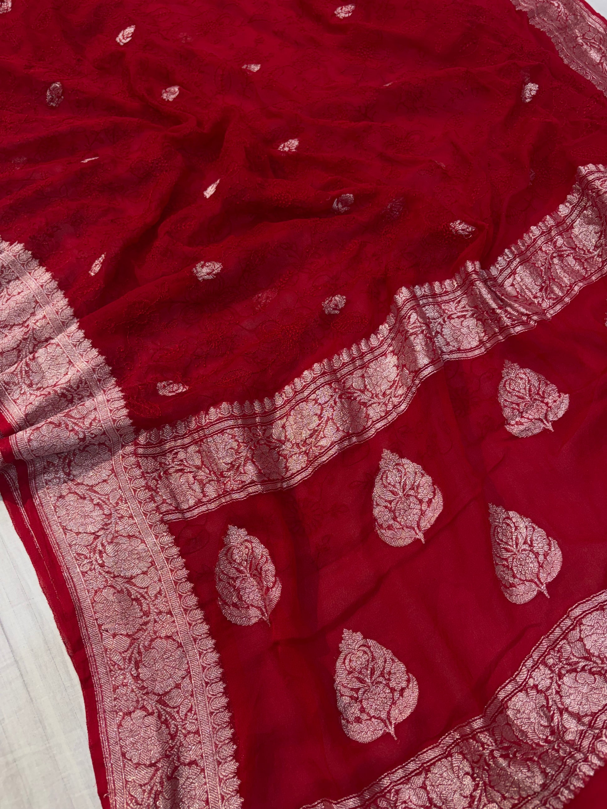 Pure khaddi chiffon saree in red colohr with all over chickenkari work