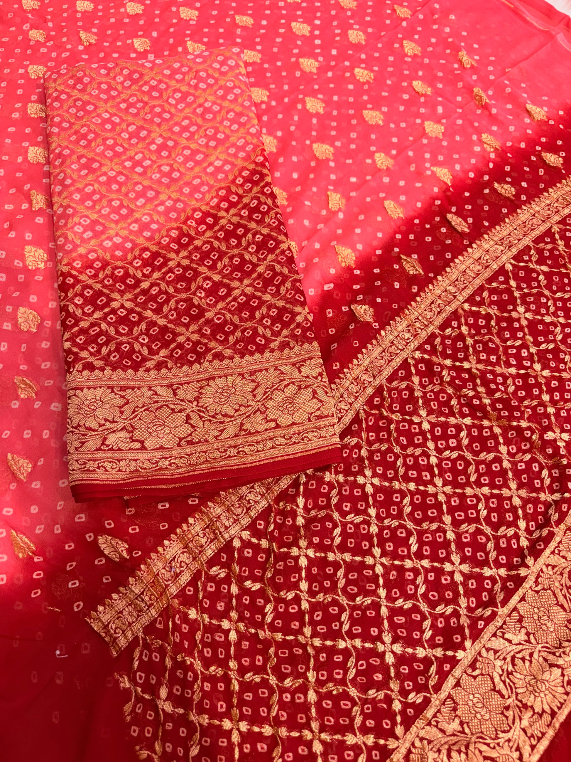 Pure georgette bandhani suit in peach with maroon red colour