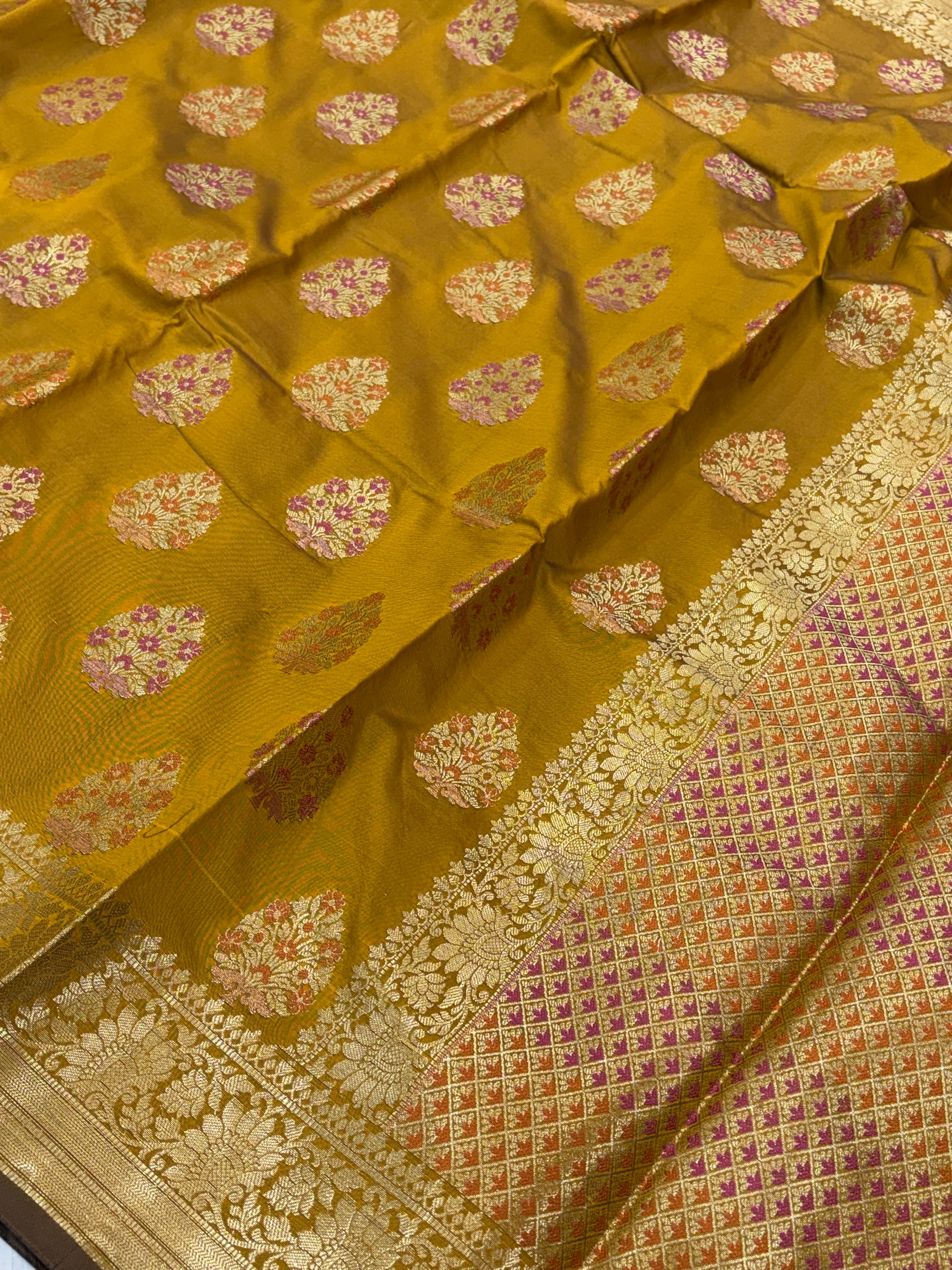 Banarasi katan by katan silk saree in mustard gold  colour with multiple meenakari work