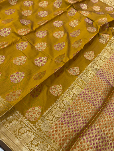 Banarasi katan by katan silk saree in mustard gold  colour with multiple meenakari work