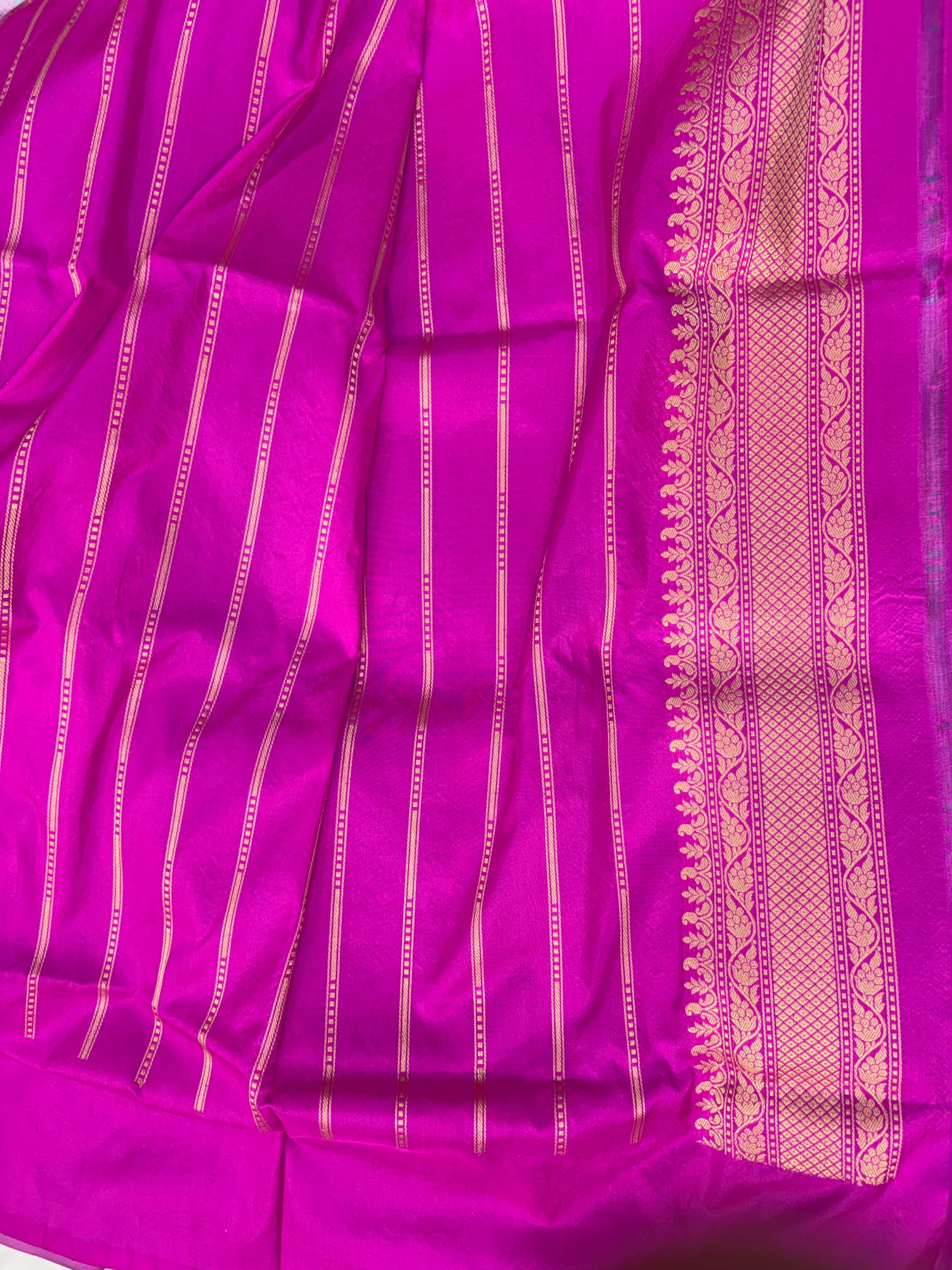 Pure katan tissue silk saree in gold colour with multiple meenakari work