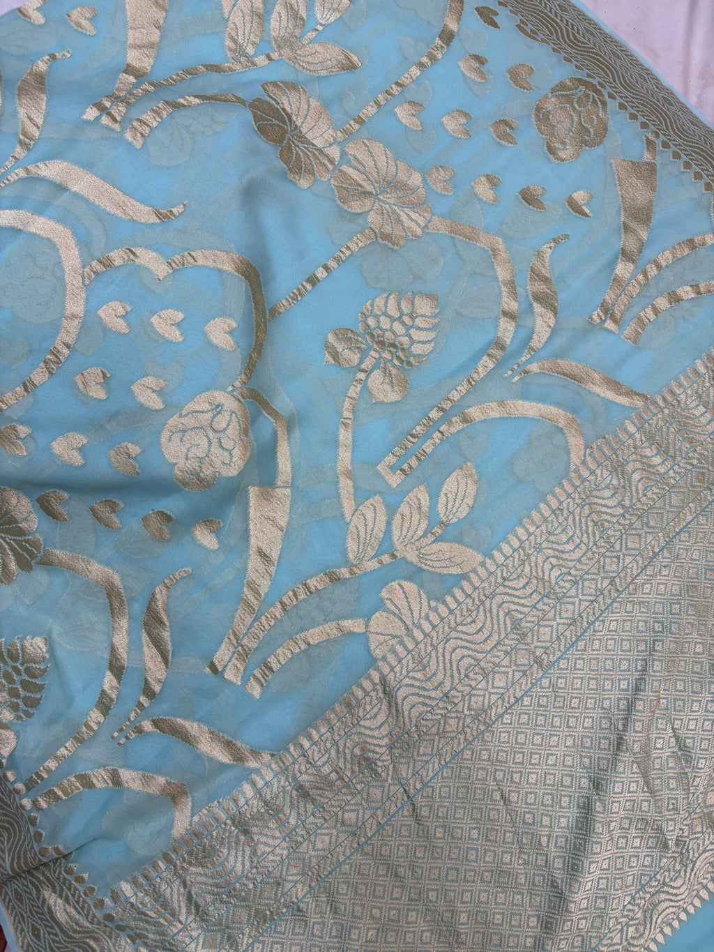 Pure georgette silk saree in pastel sky blue colour