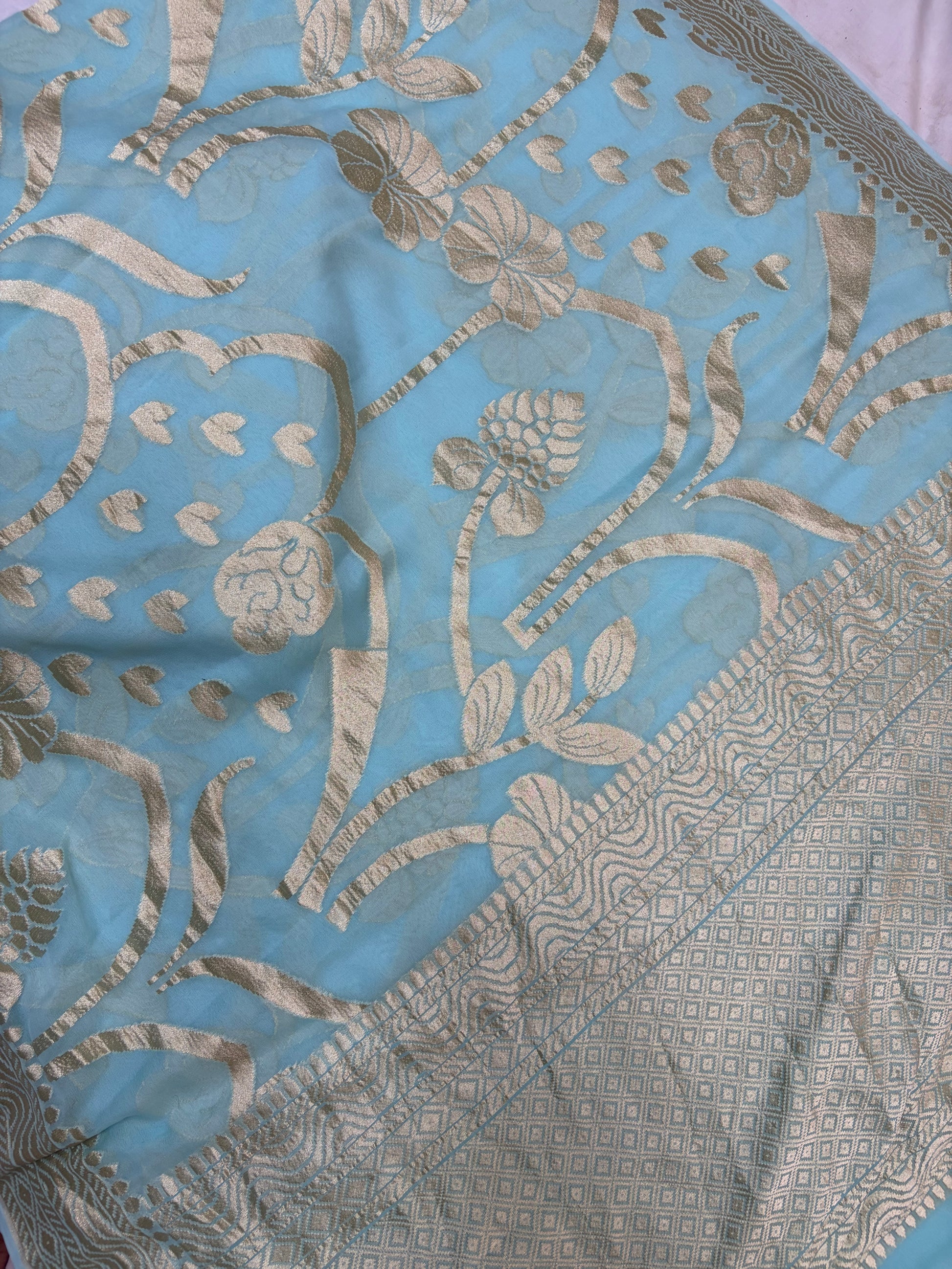 Pure georgette silk saree in pastel sky blue colour