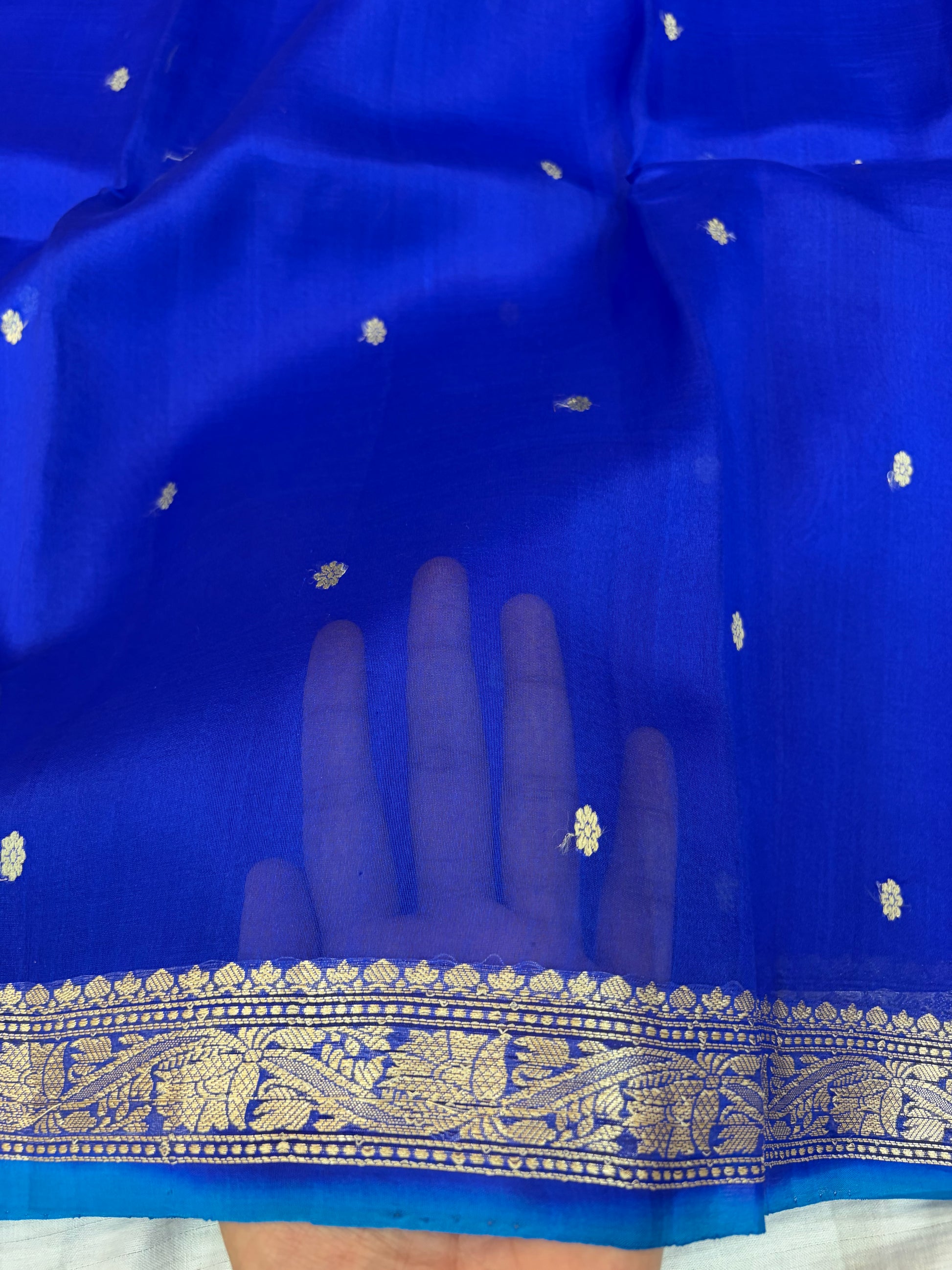 Pure handloom organza silk saree In Royal blue colour with Turquoise blue piping border