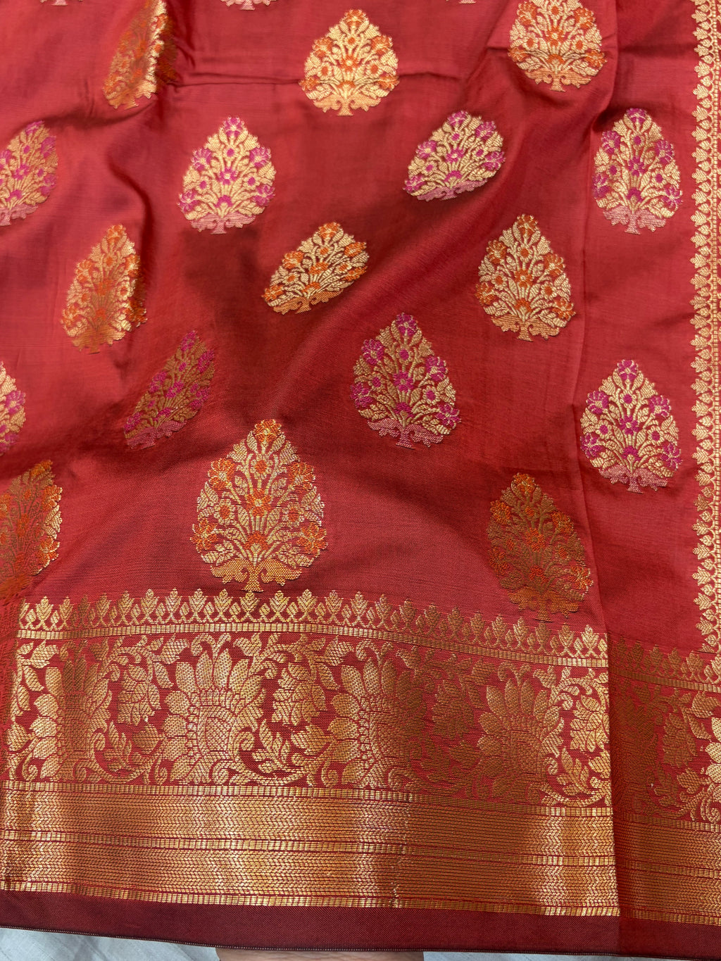 Banarasi katan by katan silk saree in cherry Red colour with multiple meenakari work