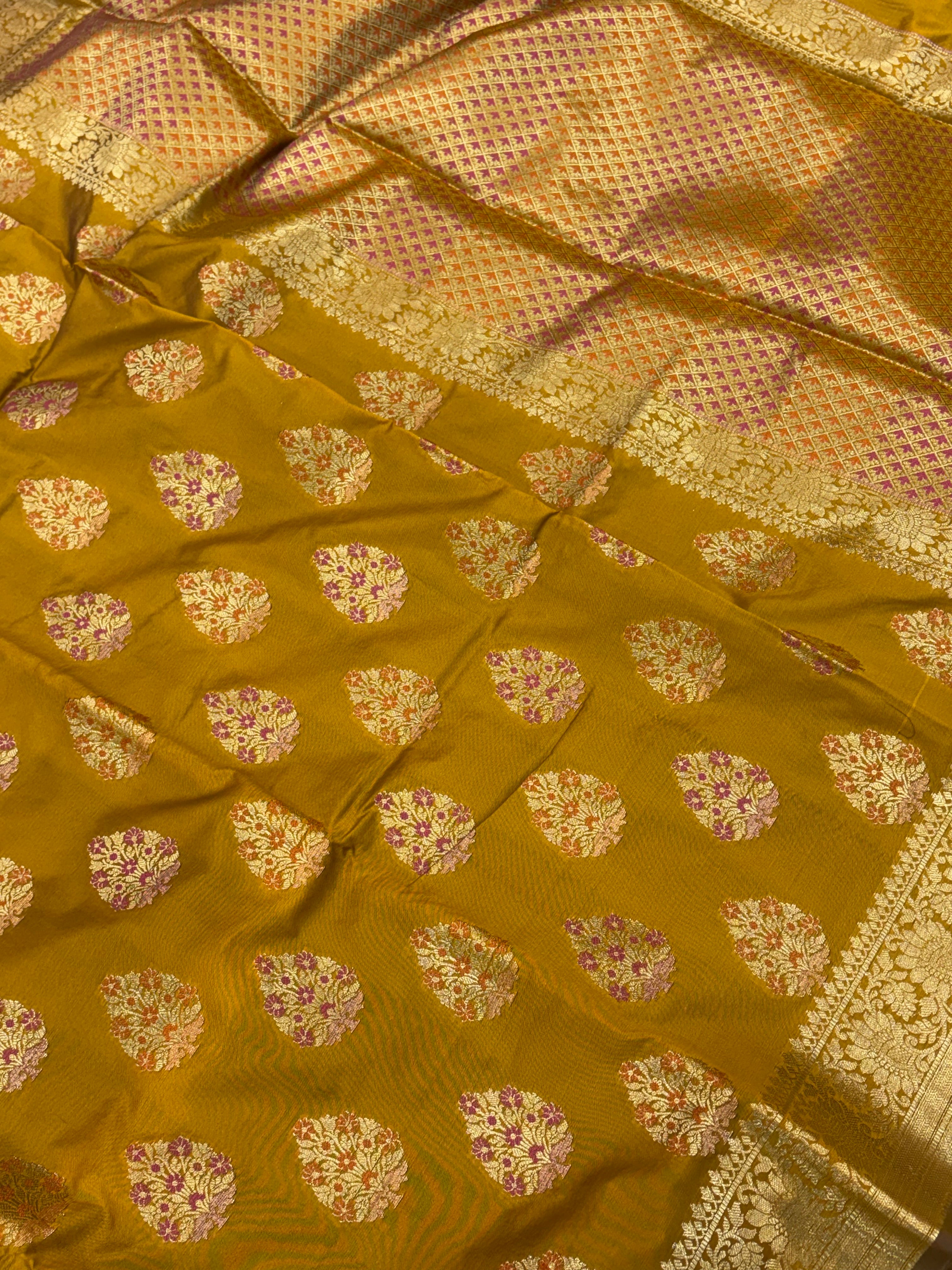 Banarasi katan by katan silk saree in mustard gold  colour with multiple meenakari work