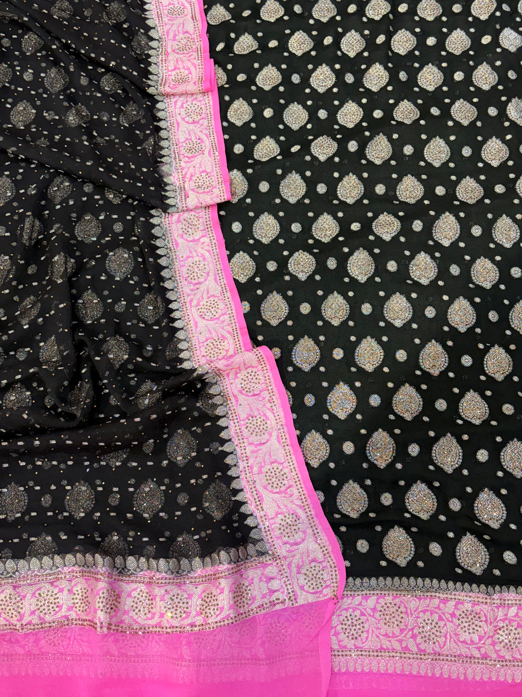 Pure khaddi chiffon suit in black with pink colour with all over swaroski work