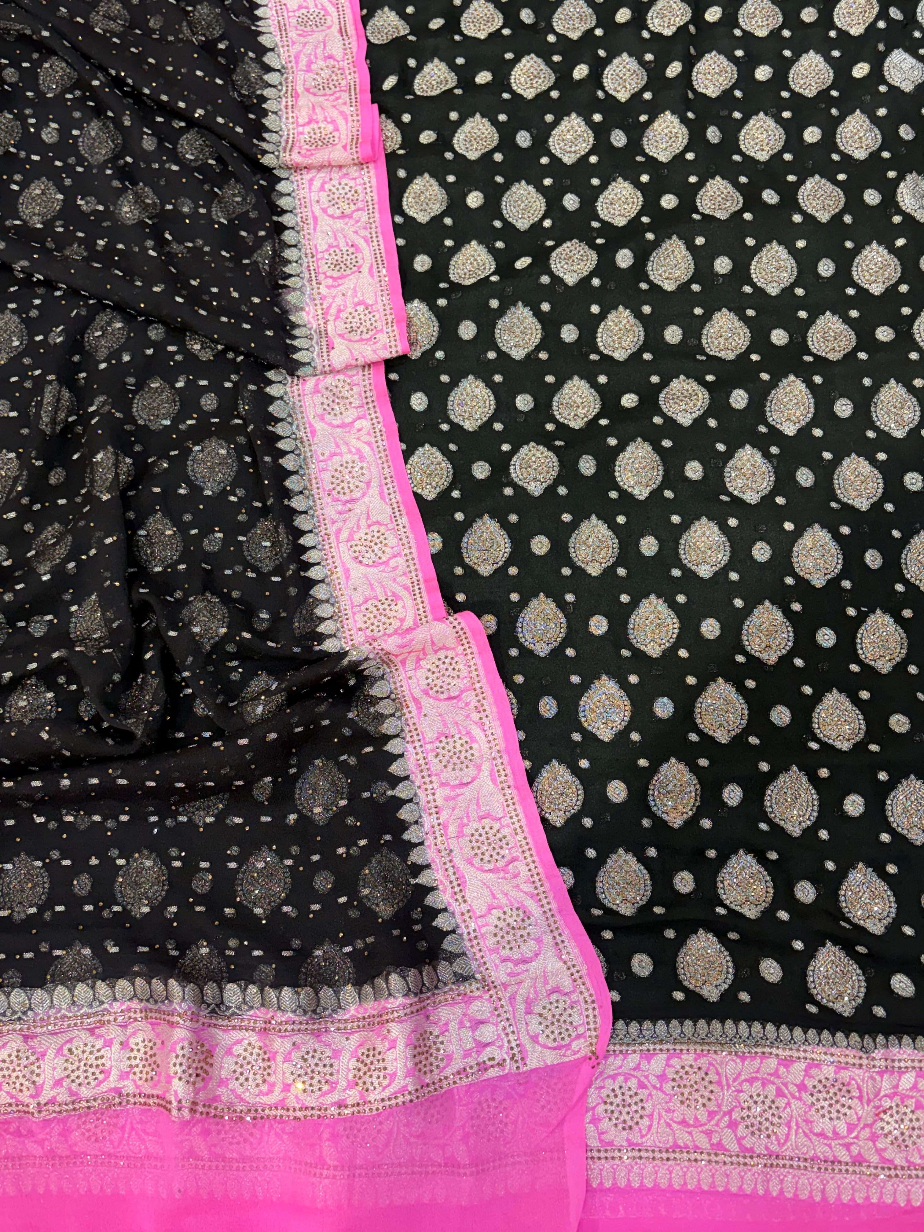 Pure khaddi chiffon suit in black with pink colour with all over swaroski work
