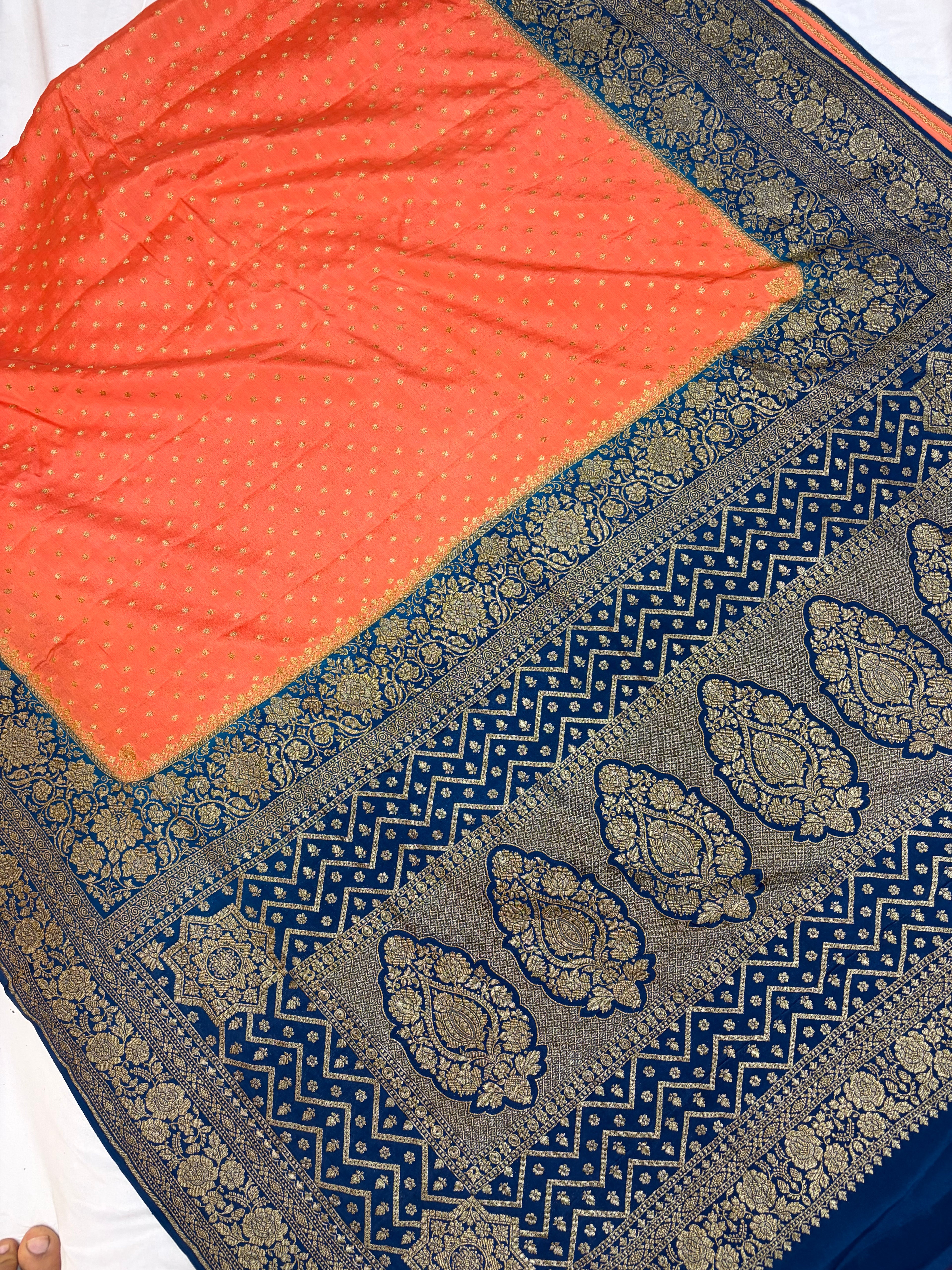 Pure khaddi crepe silk saree in peach & German blue colour