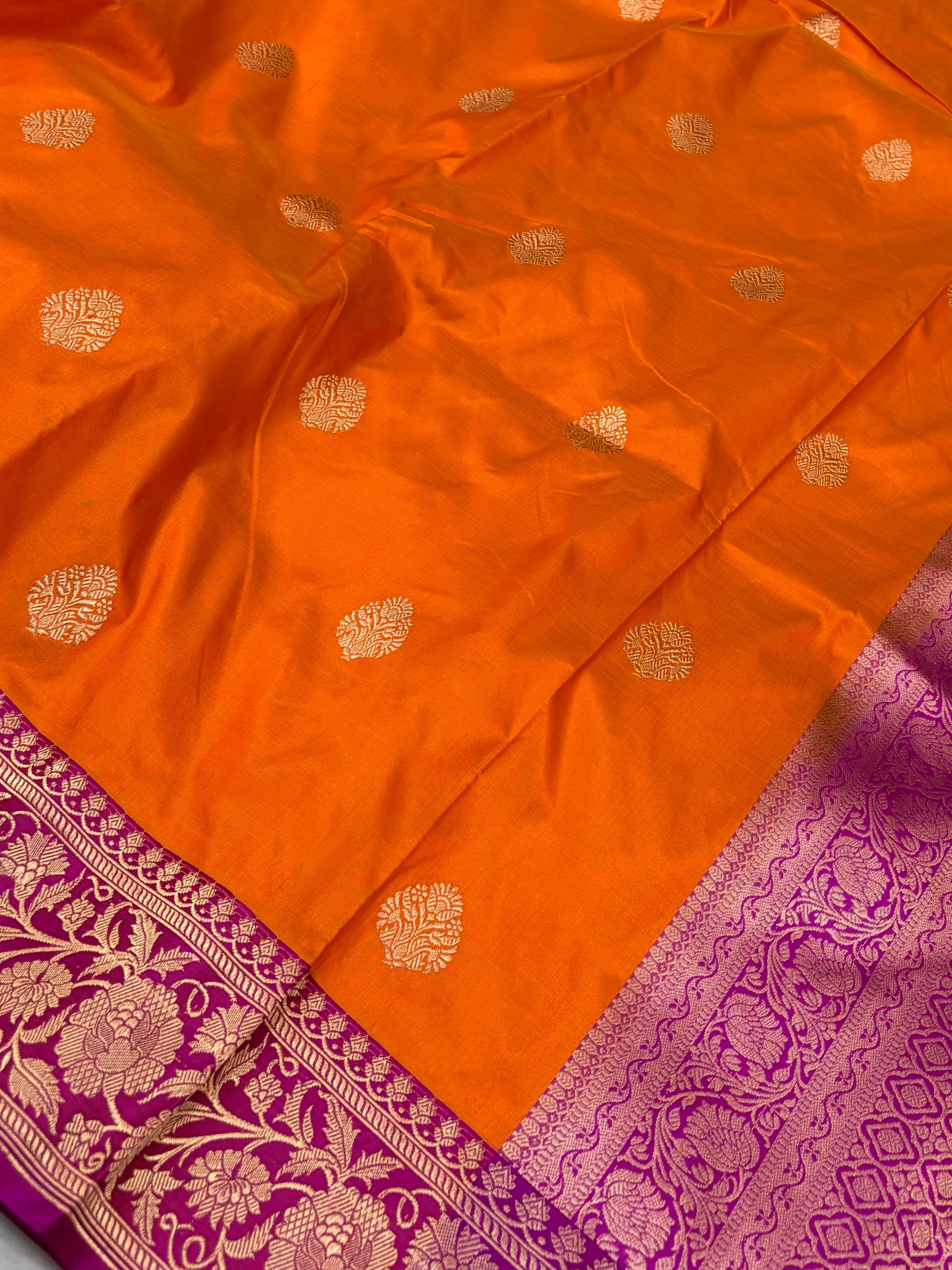 Pure handwoven katan silk saree in orange with Rani  colour