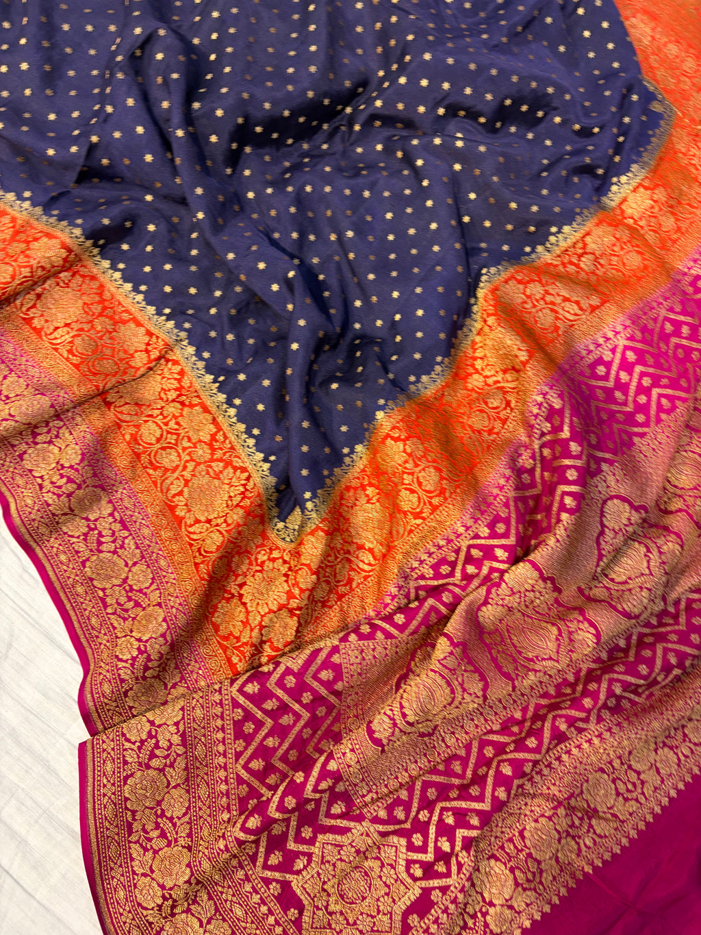 Pure khaddi crepe silk saree with 3D border in Navy blue orange & rani pink colour combination