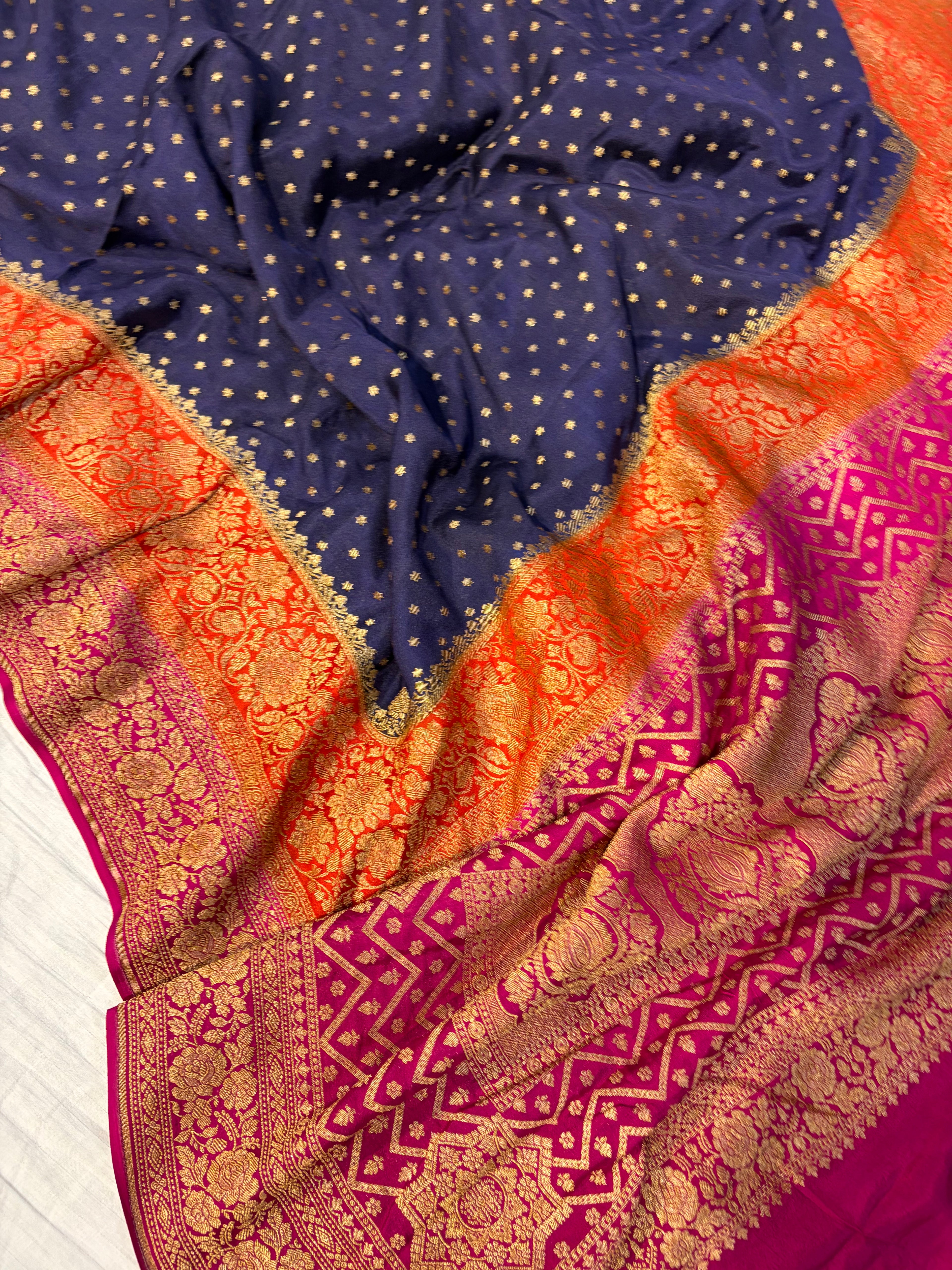 Pure khaddi crepe silk saree with 3D border in Navy blue orange & rani pink colour combination