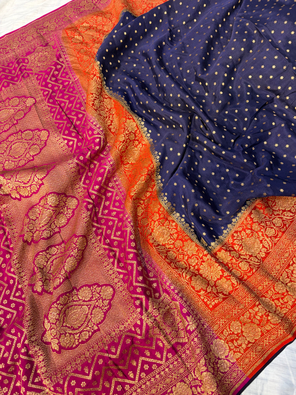 Pure khaddi crepe silk saree with 3D border in Navy blue orange & rani pink colour combination