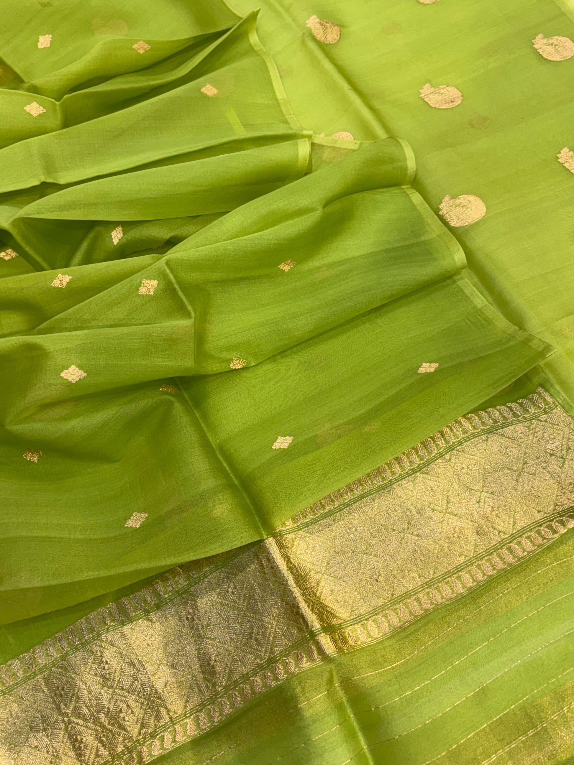 Pure Handloom Kora silk suit set in light pista green colour with meenakari work