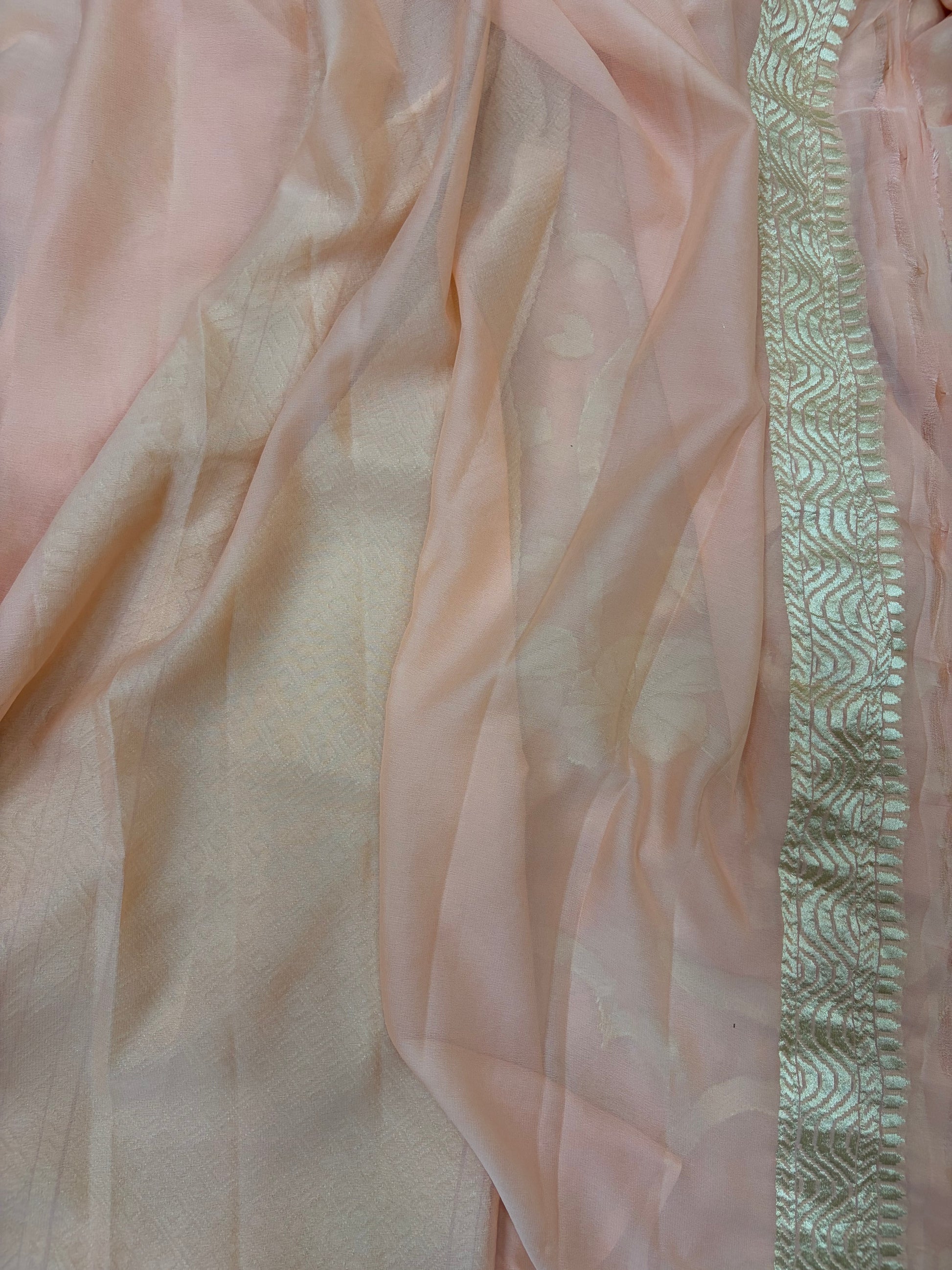 Pure georgette silk saree in pastel peach colour