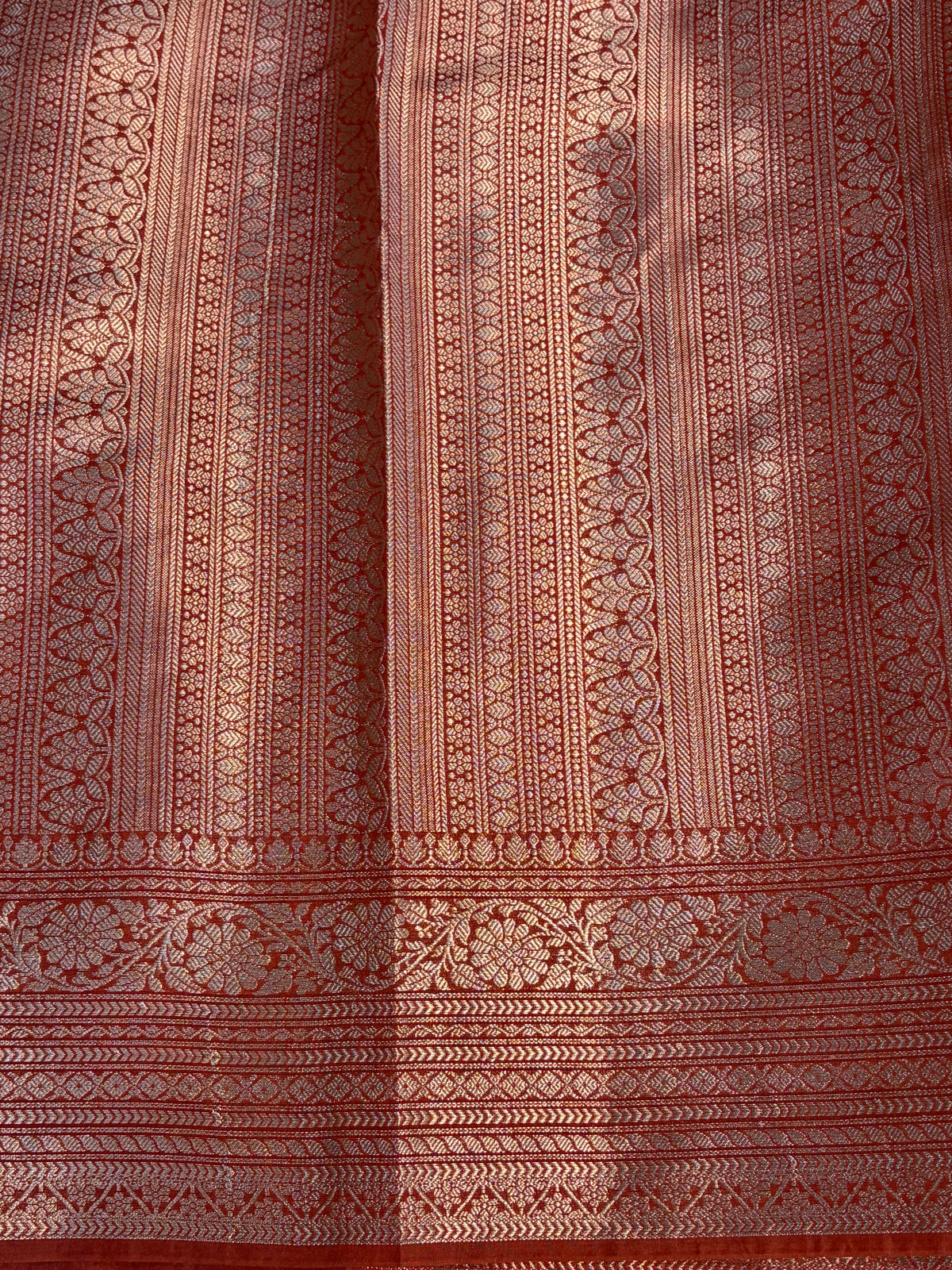 Banarasi soft katan silk saree in rust coloue