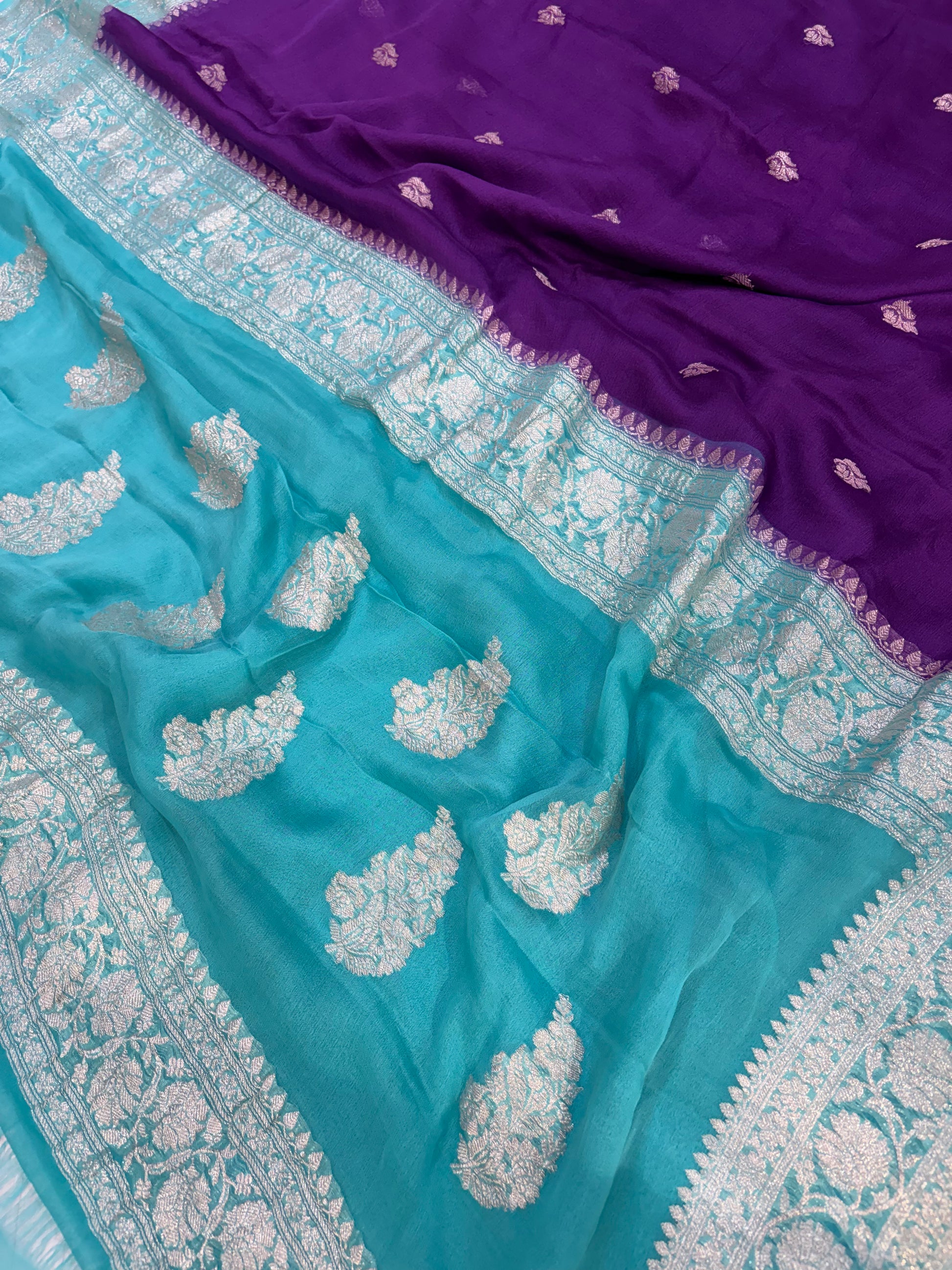 Pure khaddi chiffon saree in purple with ocean blue colour combination
