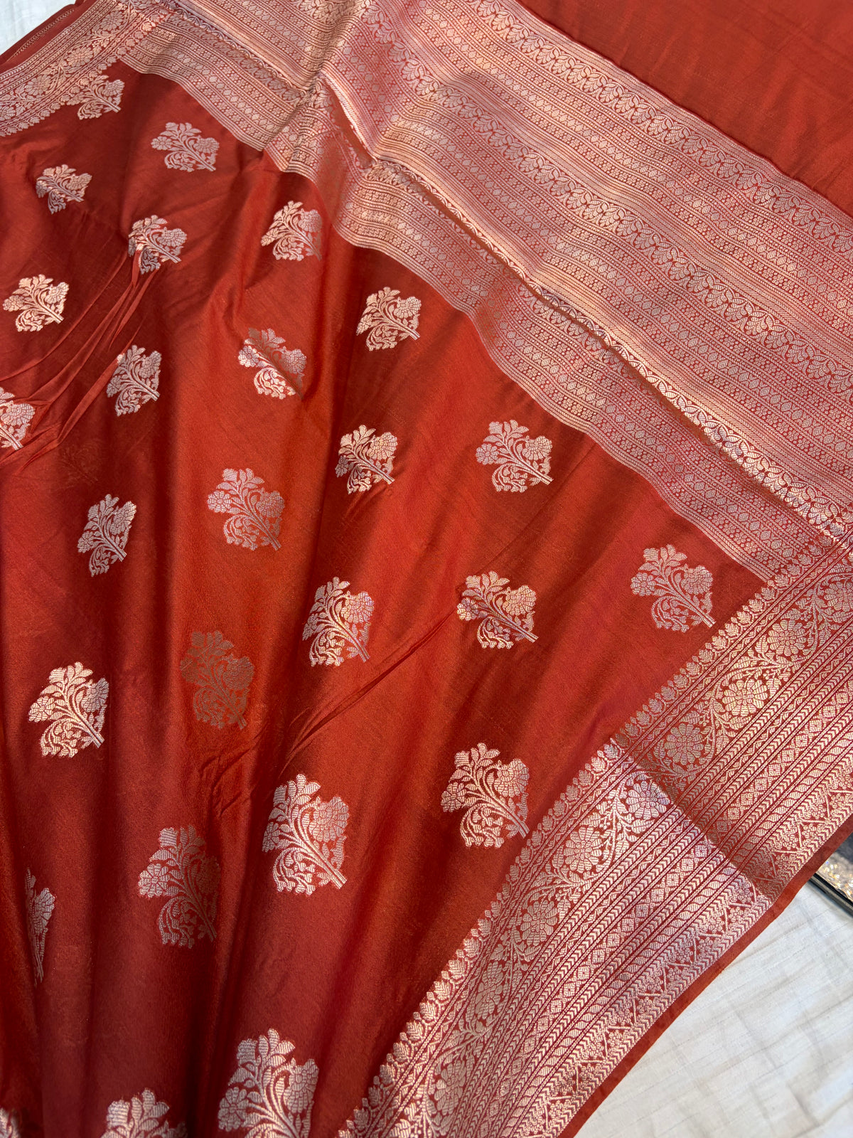 Banarasi soft katan silk saree in rust coloue