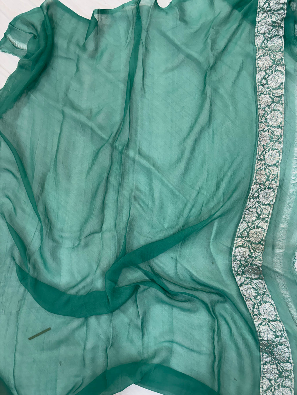 Pure khaddi chiffon saree in Teal green colour