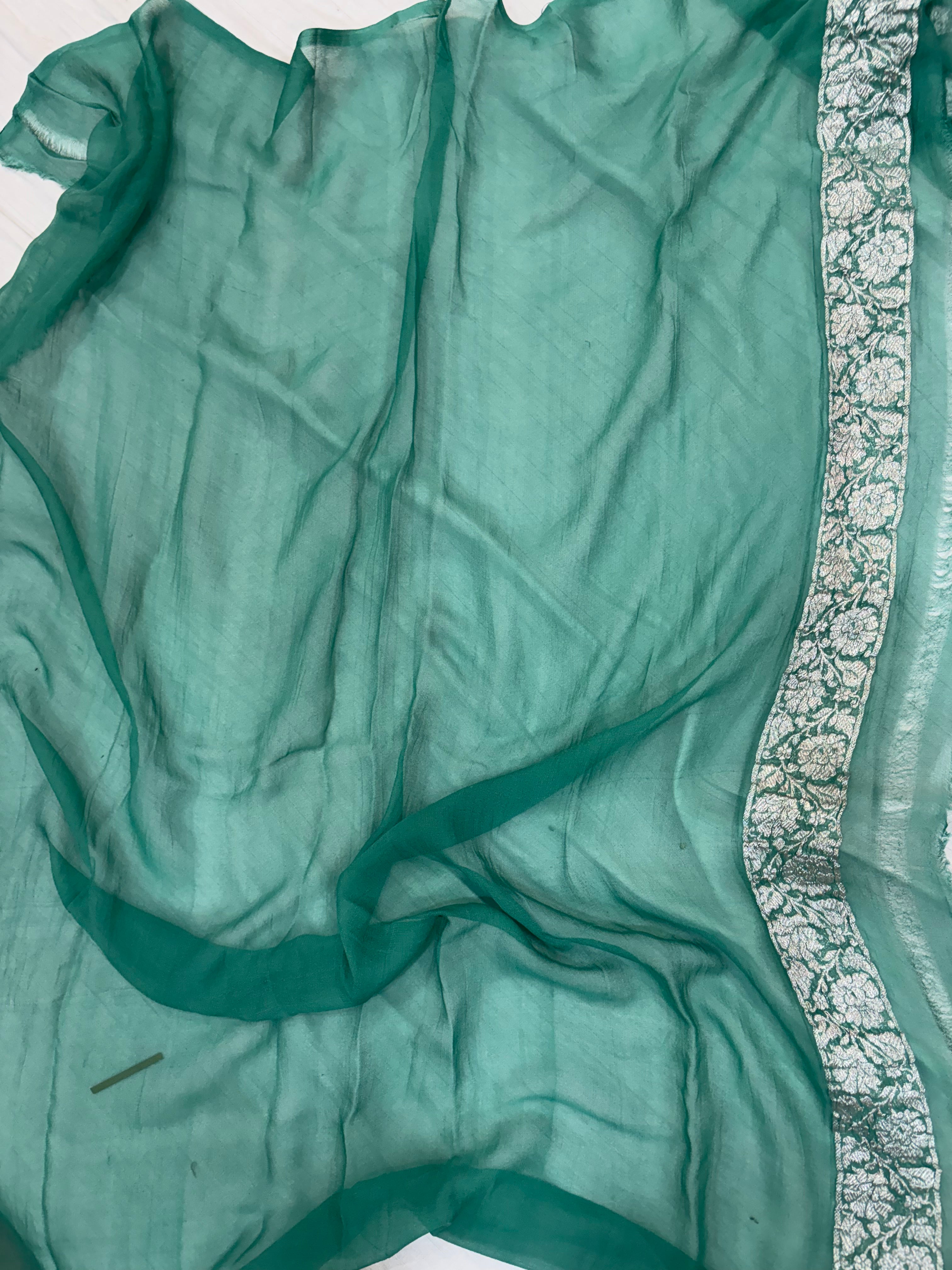 Pure khaddi chiffon saree in Teal green colour