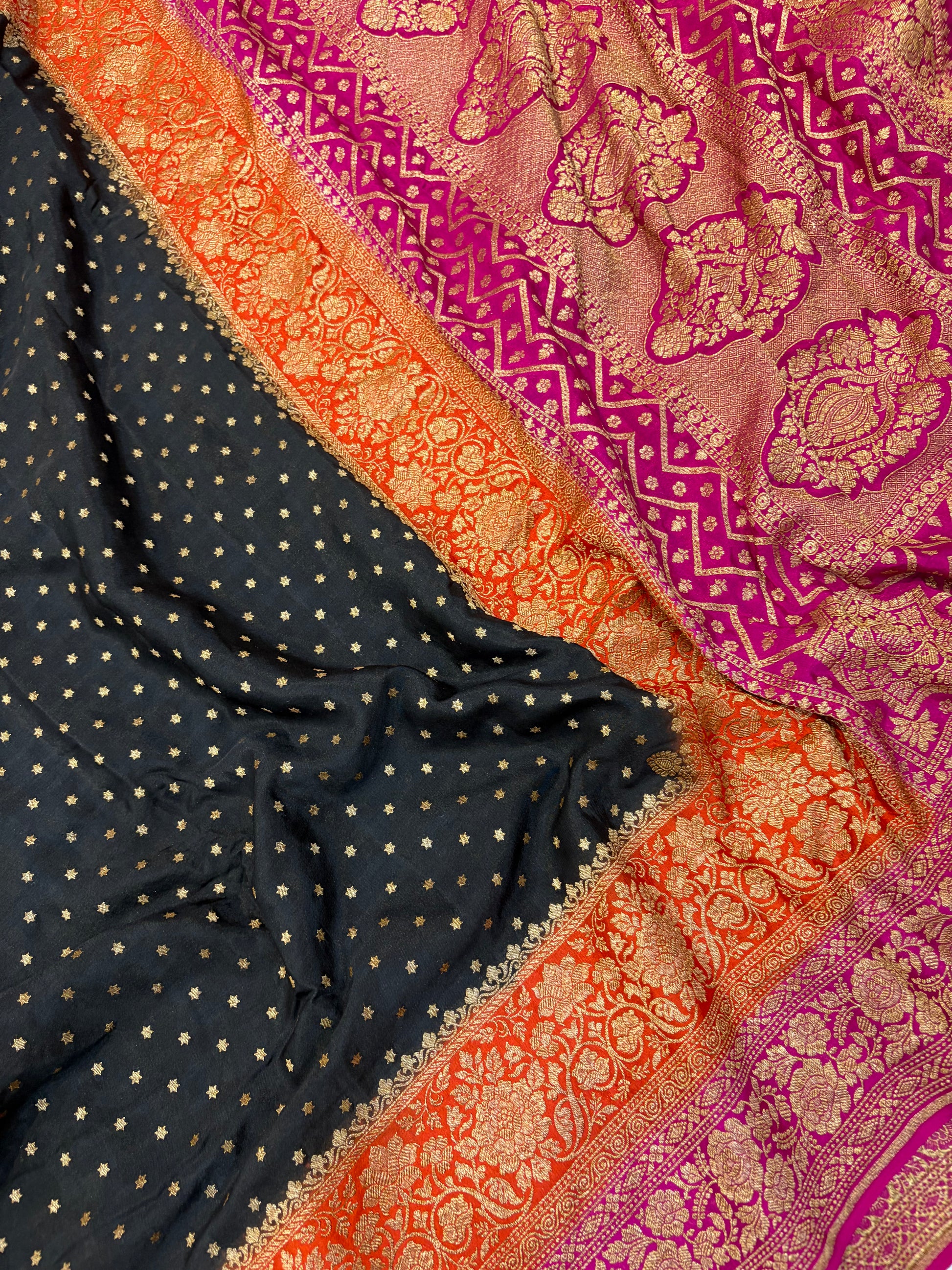 Pure khaddi crepe silk saree with 3D border in black orange & rani pink colour combination